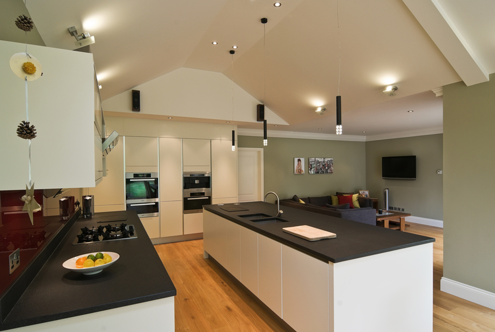 Kitchen view of a house extension by Harvey Norman Architects Cambridge