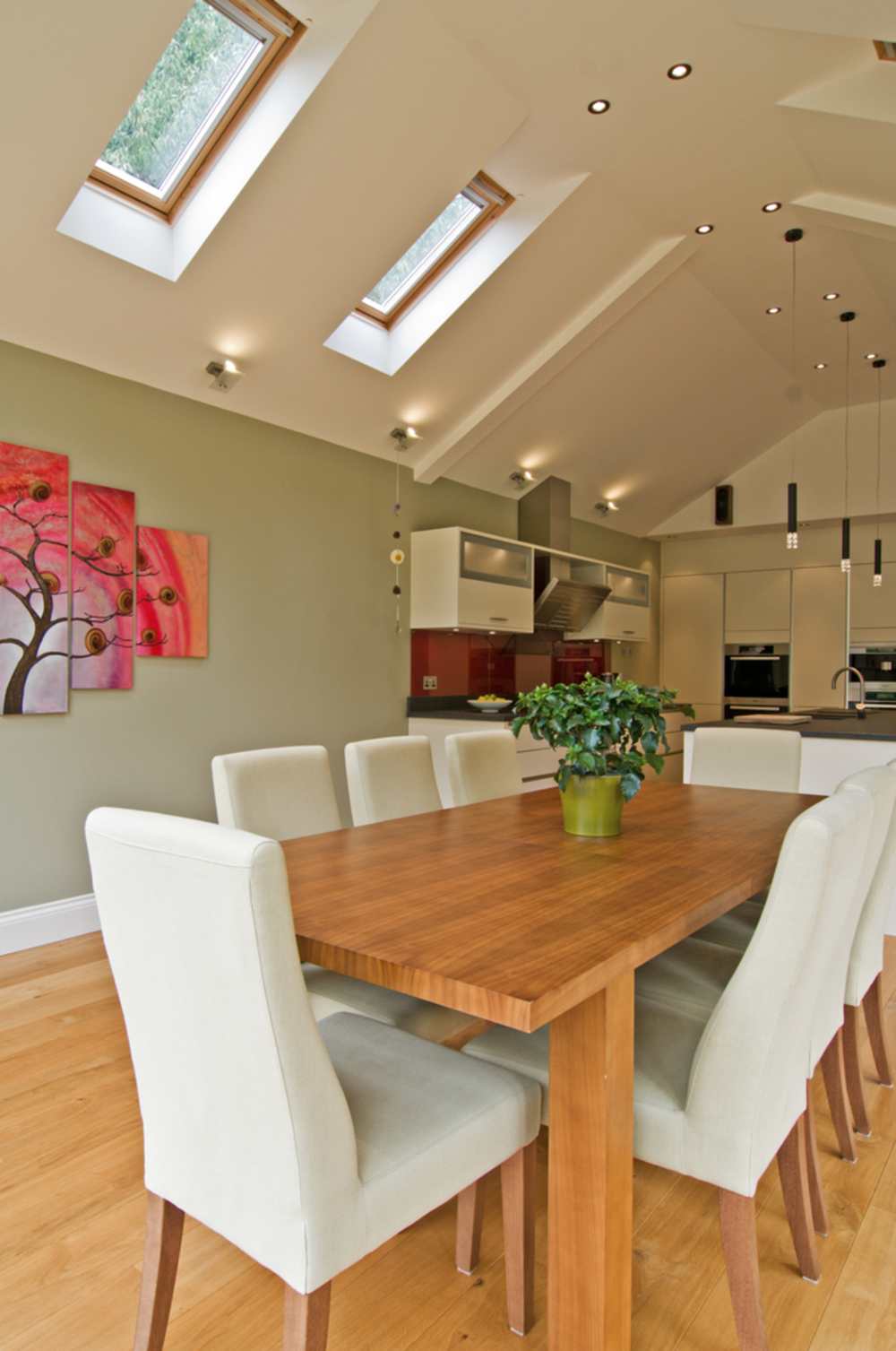 Dining room table of a house extension by Harvey Norman Architects Cambridge