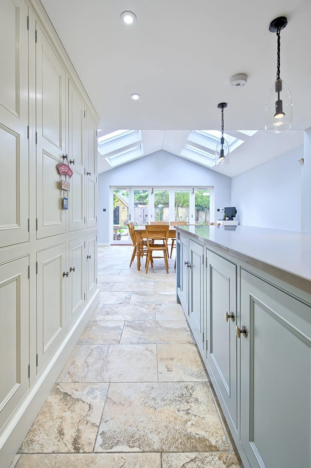 Kitchen cupboards of a house redesign by Harvey Norman Architects Cambridge