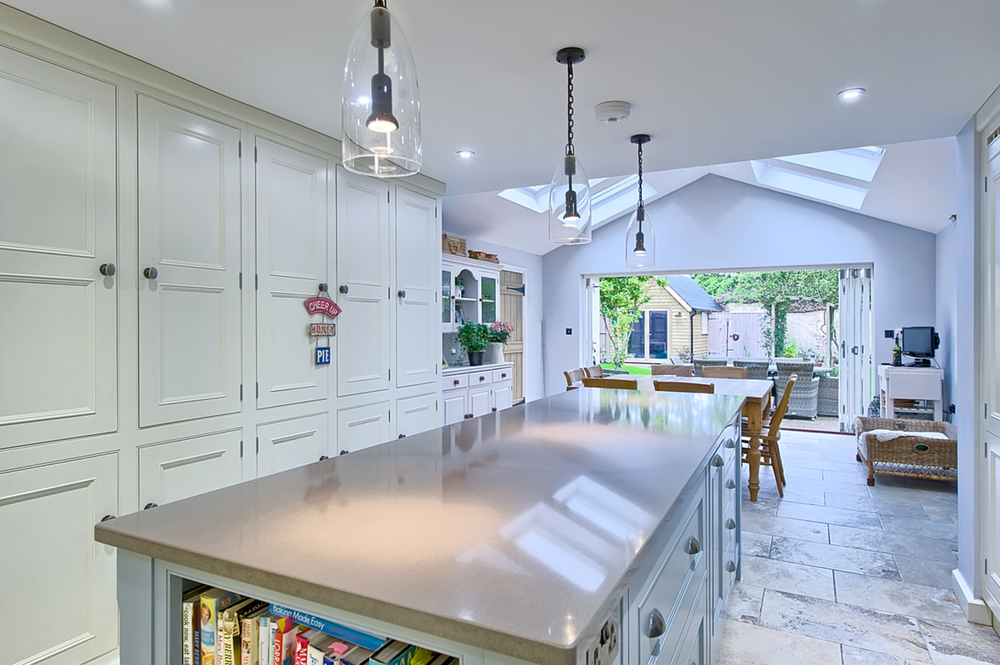 Kitchen island counter of a house redesign by Harvey Norman Architects Cambridge