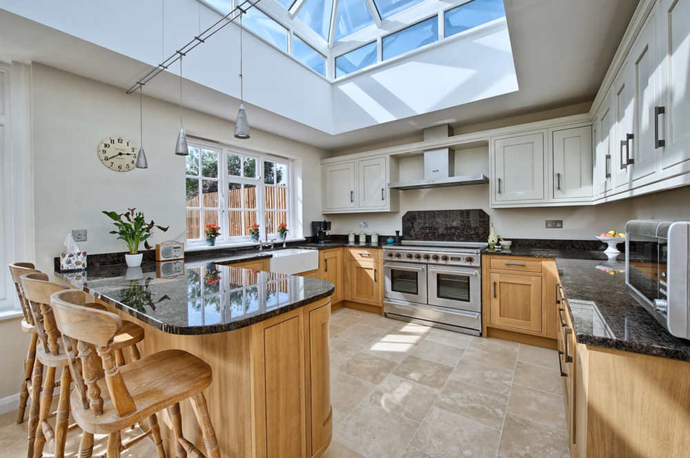 Kitchen view of a house extension by Harvey Norman Architects St Albans