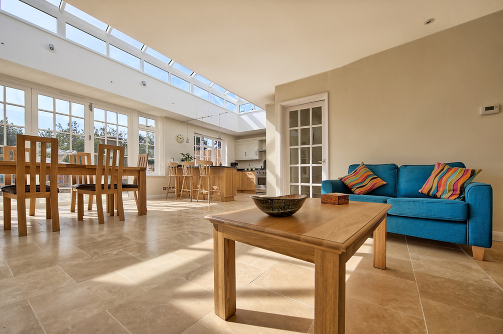 Sitting area coffee table of a house extension by Harvey Norman Architects St Albans