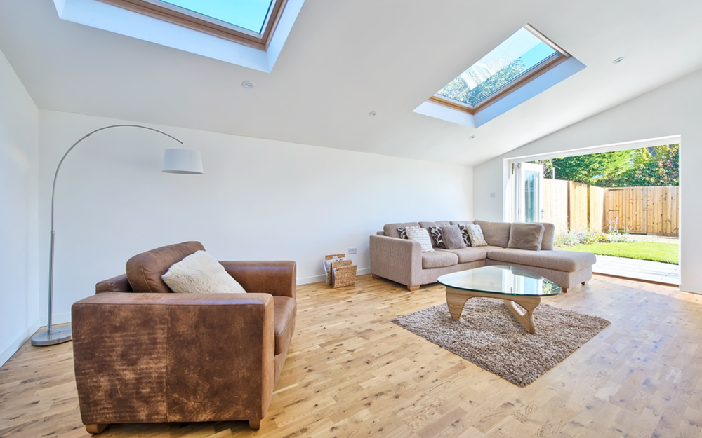 Sitting with lots of natural light of a house extension by Harvey Norman Architects Cambridge