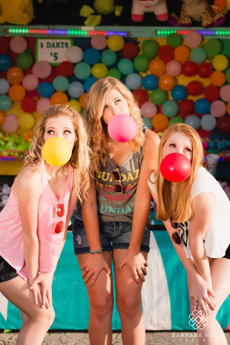 Senior girls playing games at the fair