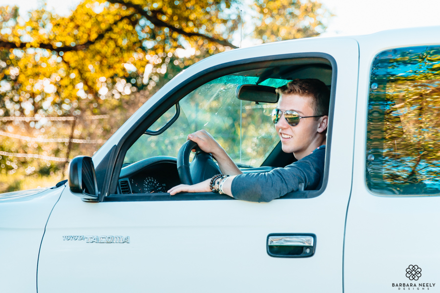 Senior guy with his truck on the farm