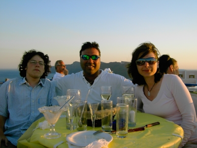 My family and I enjoying a rooftop sunset in Oia, Santorini