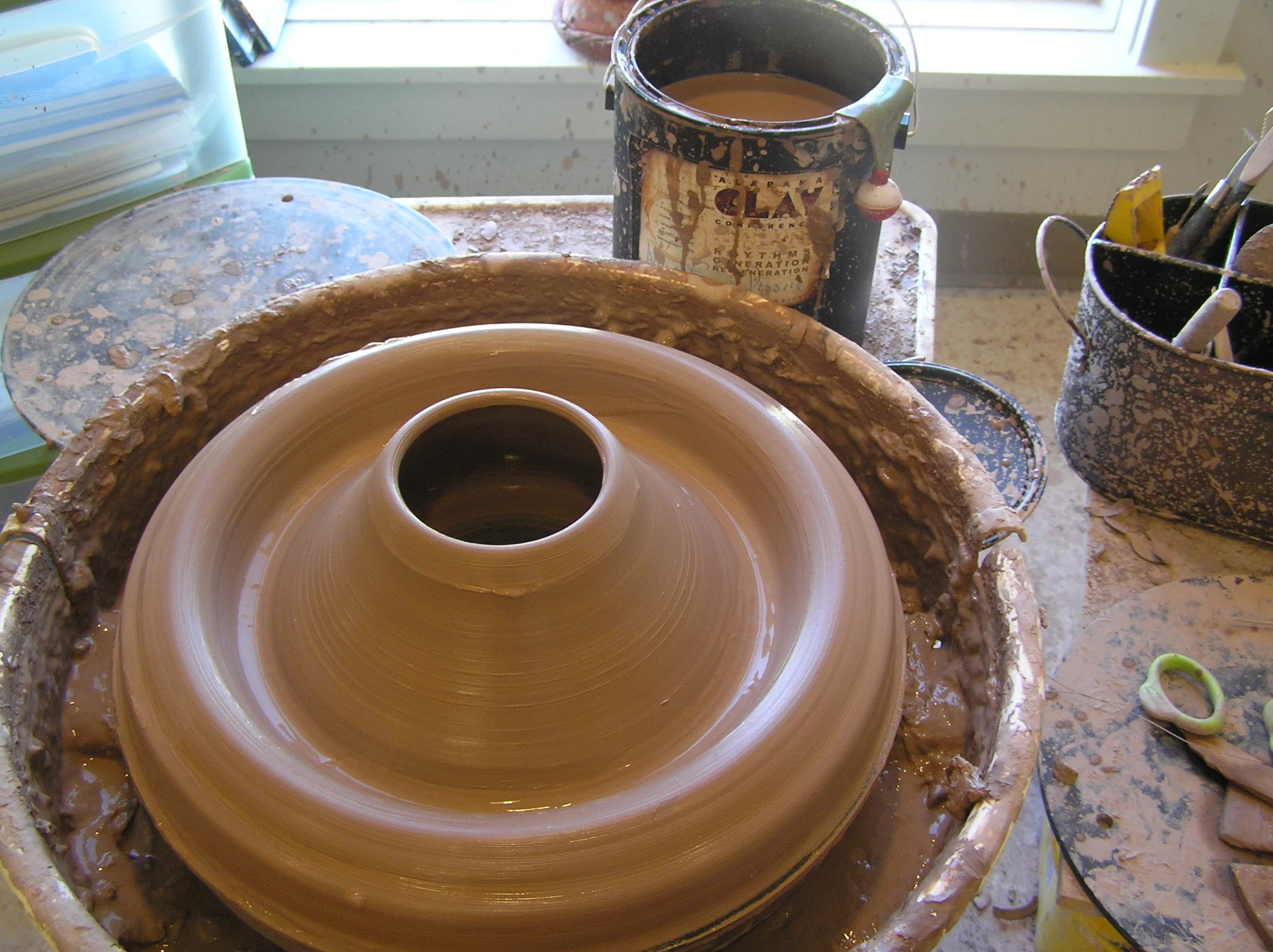 Throwing a double walled vessel