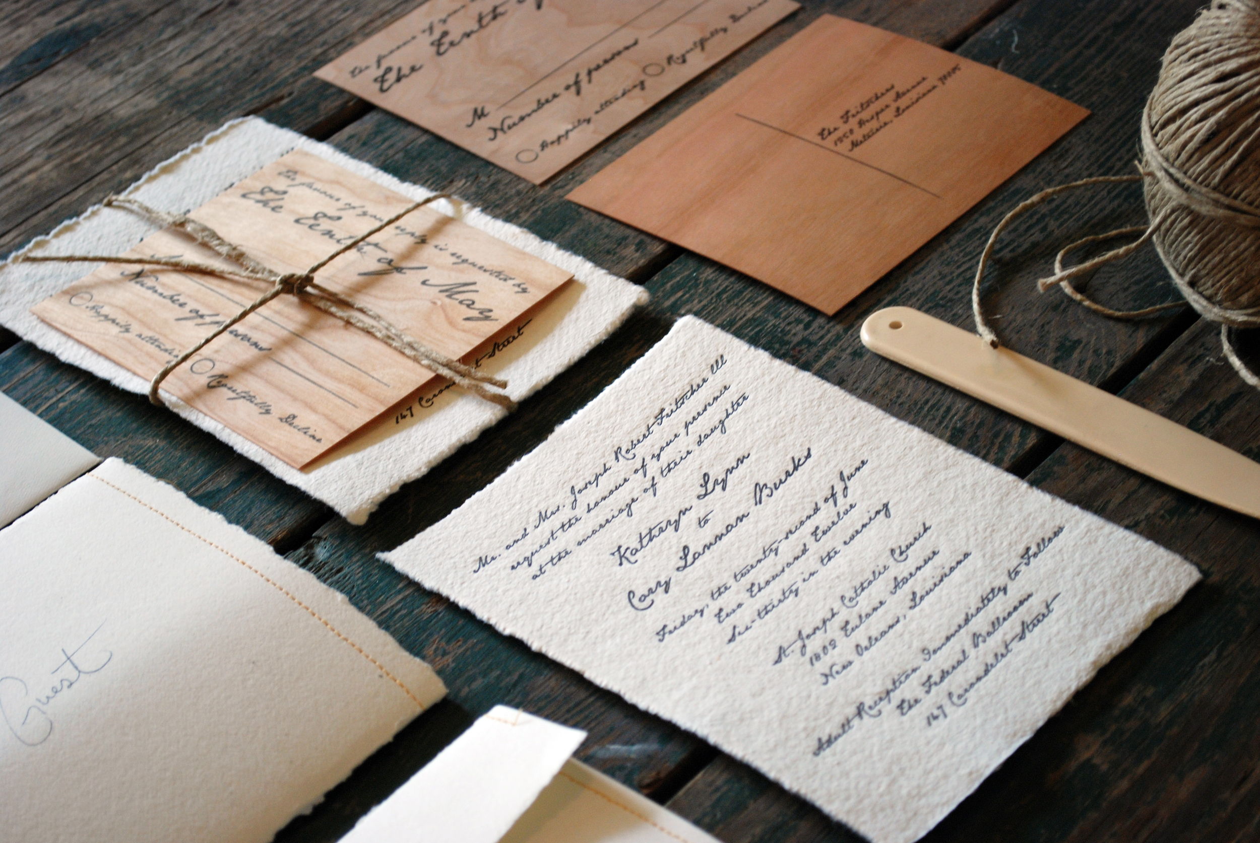 When I first met with Kate, I knew immediately that her wedding and inspirations were to die for. She had a very rustic meets Jane Austin style between the lettering, paper, and assembly of her wedding stationery suite. The invitations were hand torn to leave a deckled edge. The rsvp cards are made of real wood, letterpress printed in a postcard style. The inner envelopes were handmade and stitched, all enclosed in an outer cotton envelope. …and of course there was twine.