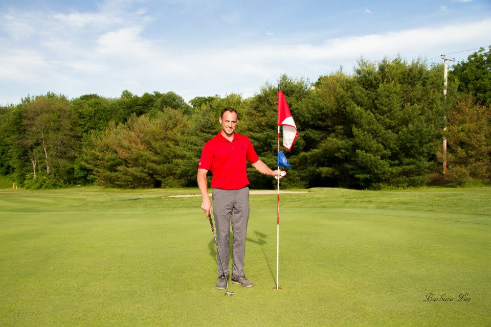 Golfer with flag.jpg