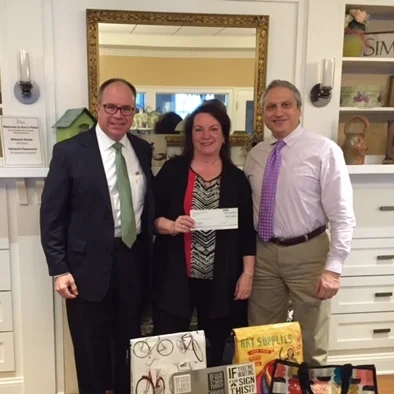 Above: Scott Cooney & Marie Borner of Coldwell Banker, Anthony Zeolla, CPA, President of Ann's Place