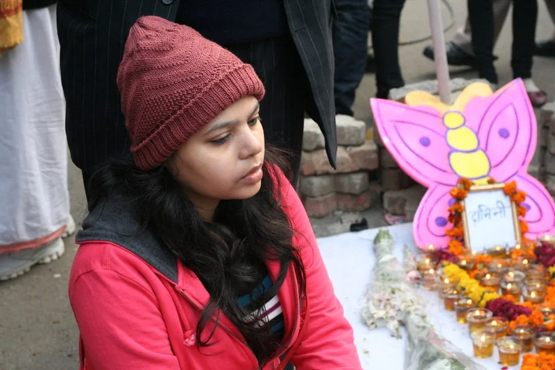 " Protester Posters and Candles seeking Justice for Gang rape Victim-008 " by Ramesh Lalwani is licensed under CC BY 2.0