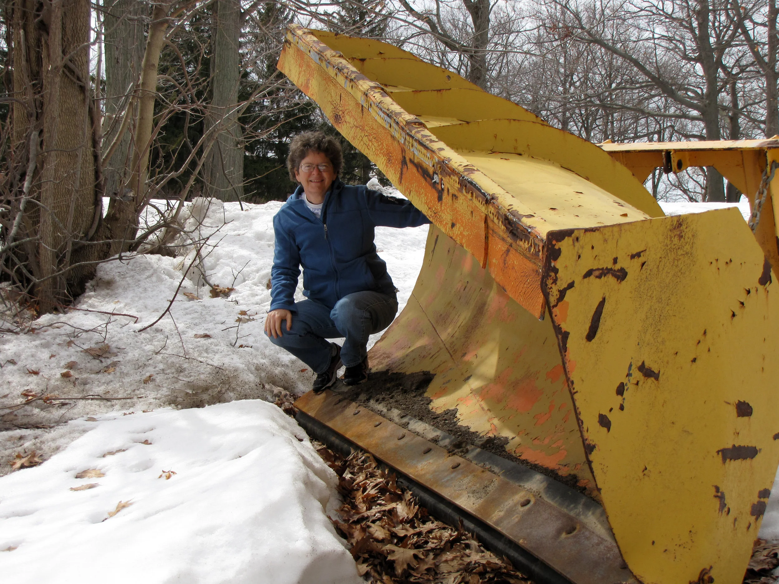 Jo Ann Butler, author and Fulton Library's Memoir Project team member, getting ready to take her ride on a snowplow.