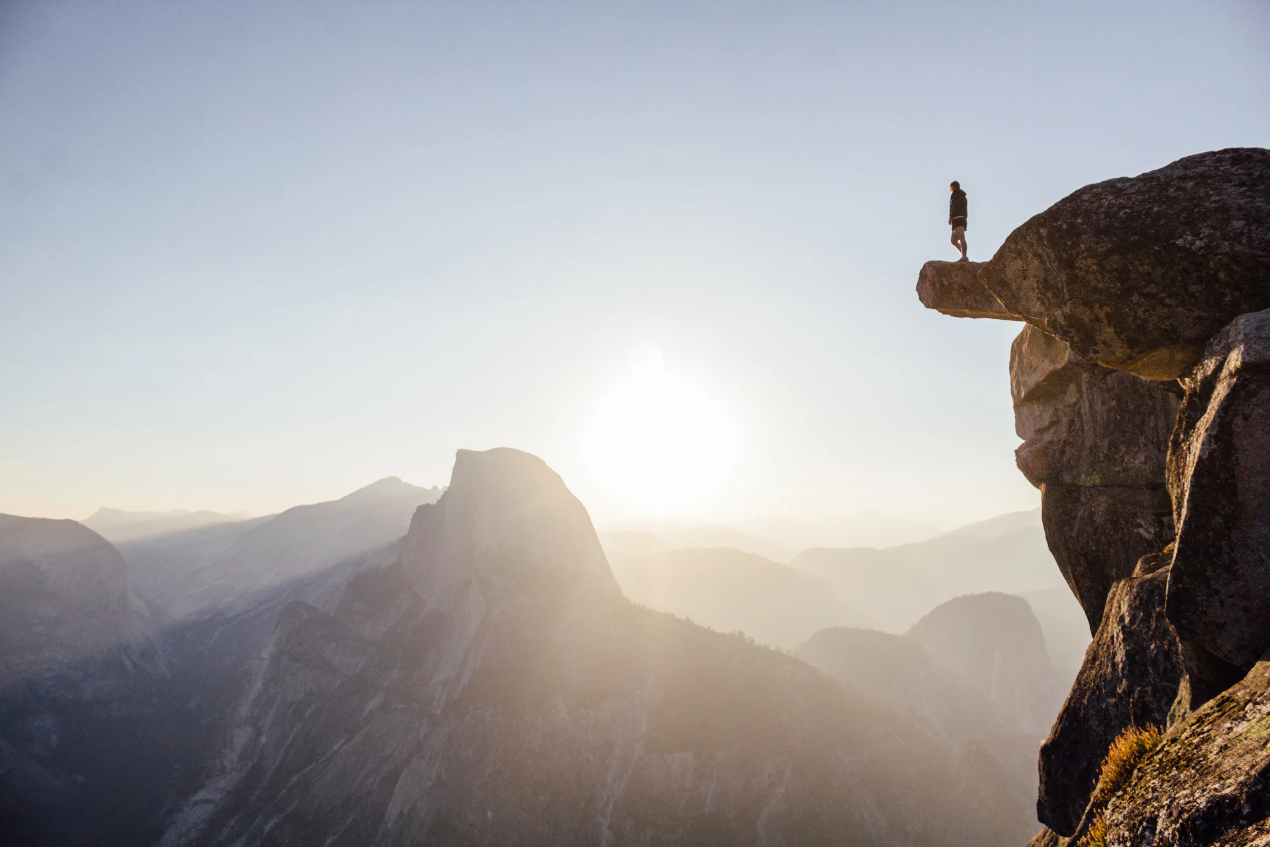 Photo by Christian Becerra (@throughthetinylens) of myself and Half Dome