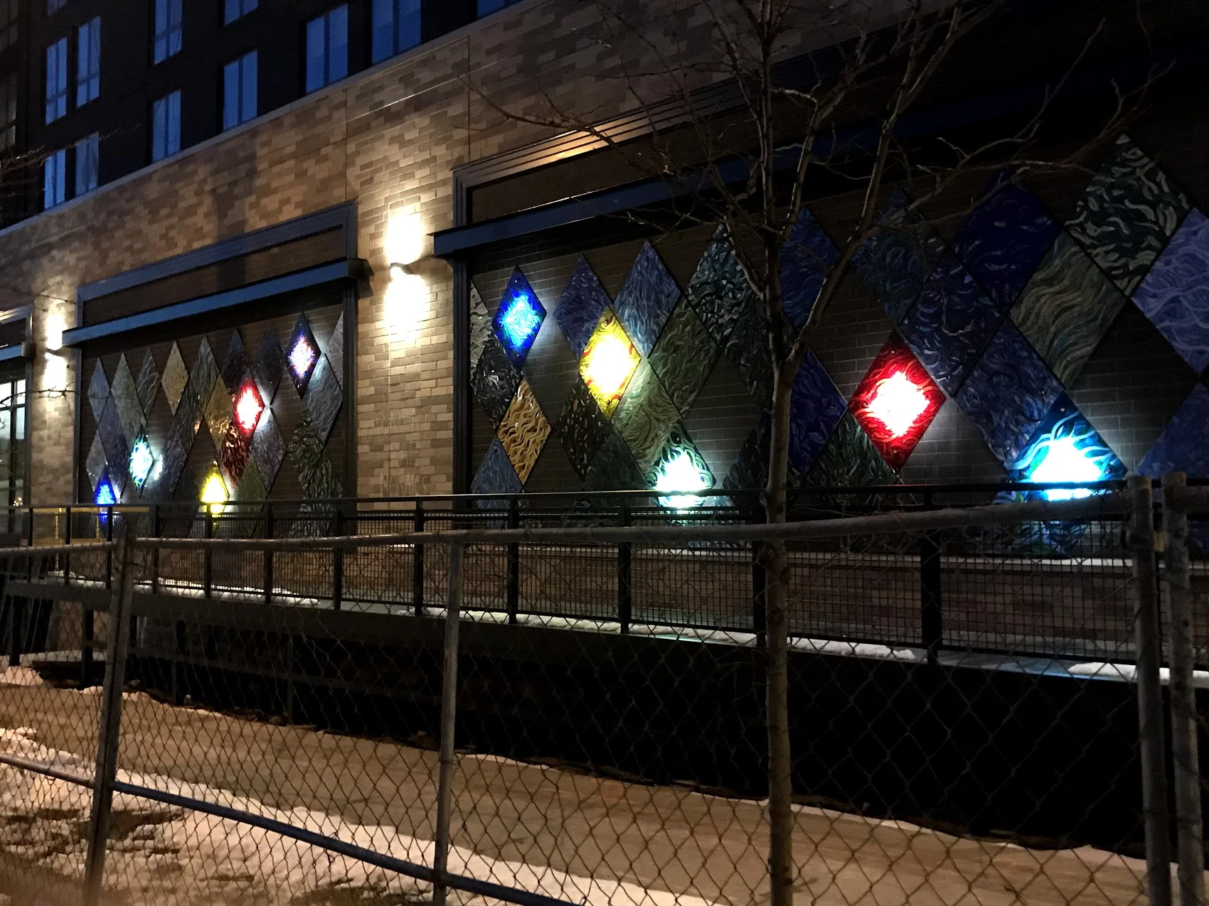 Rise mural at night