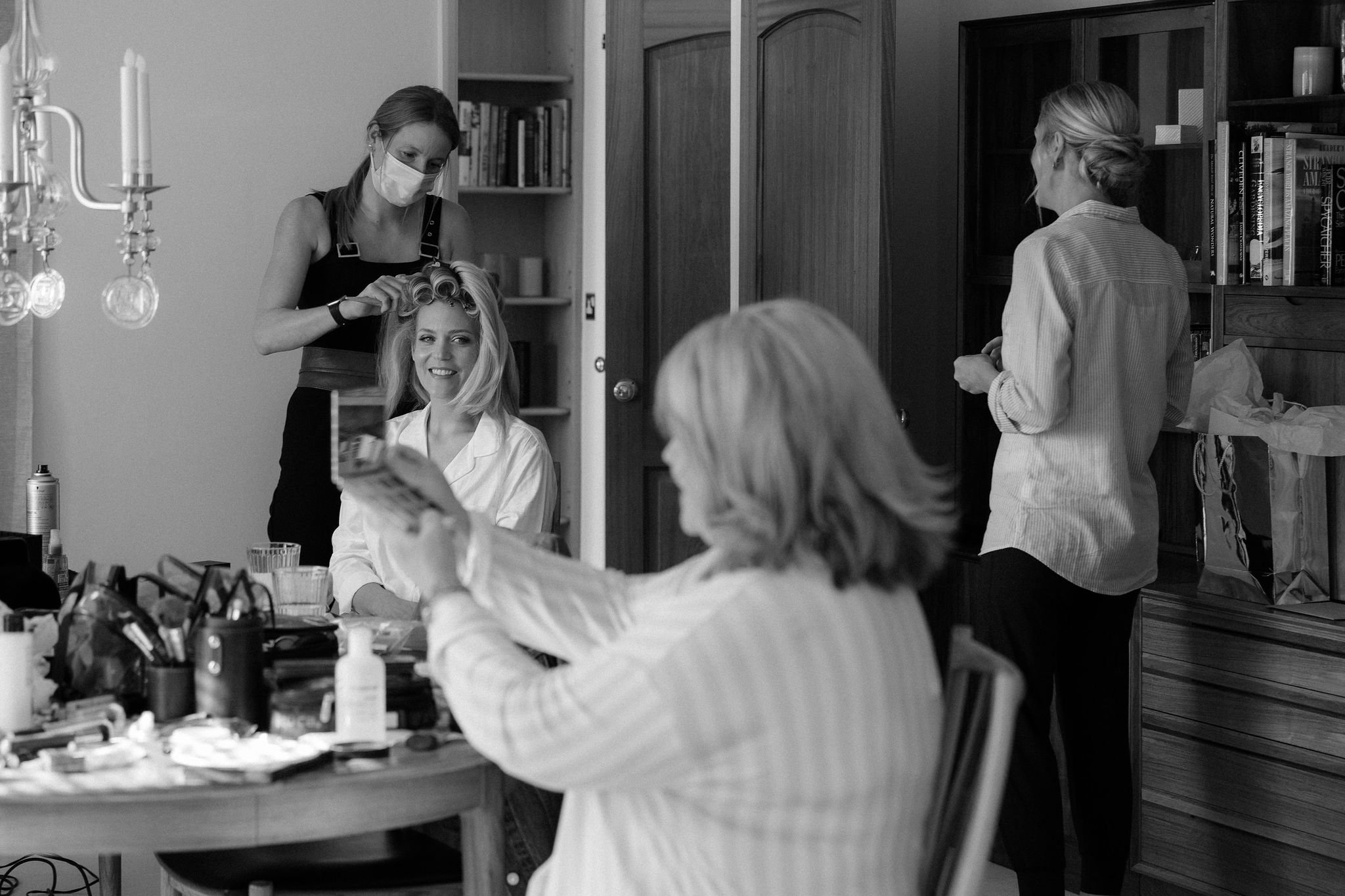 Bride and mother of the bride on wedding morning candid photo