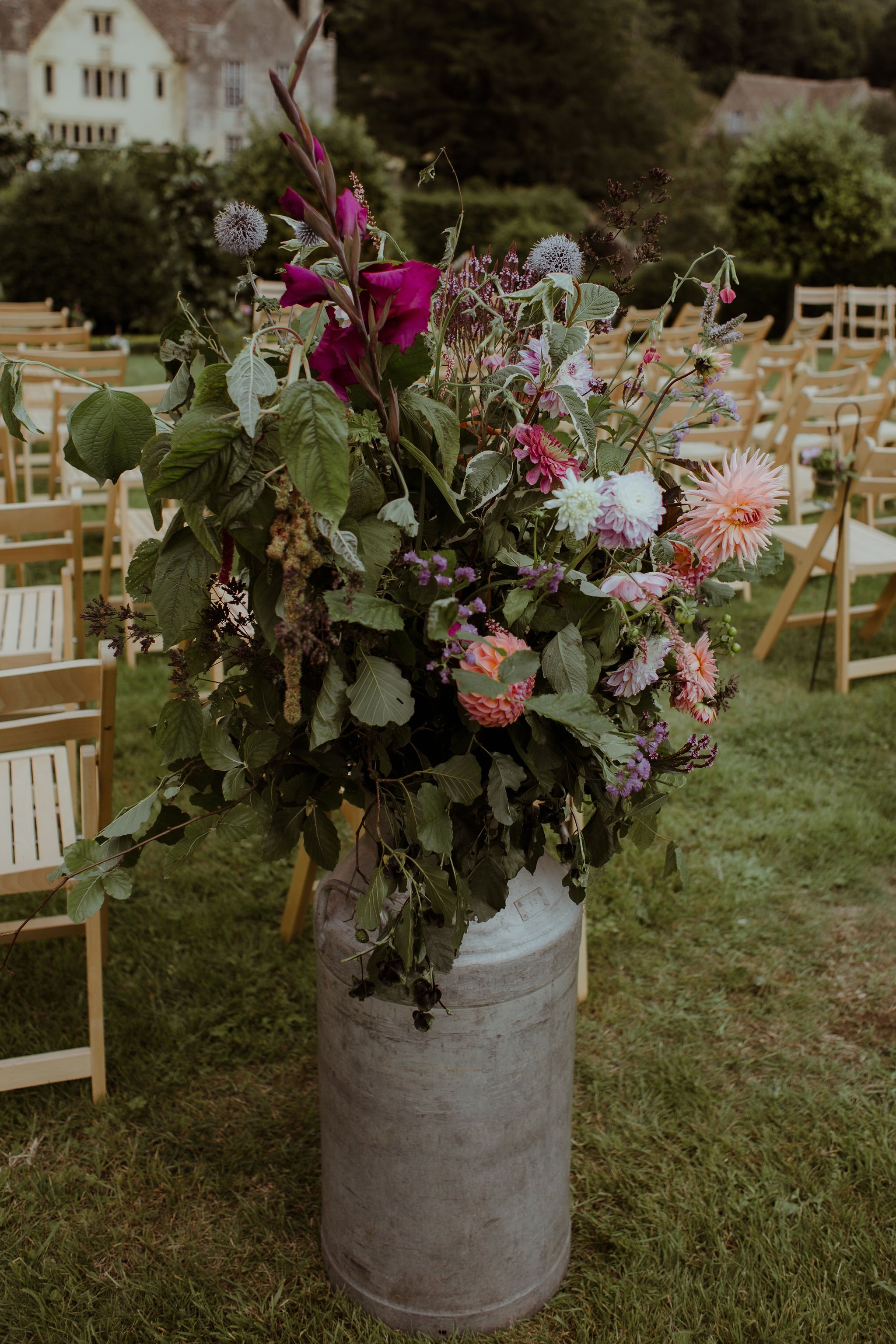 English summer florals at Owlpen Manor for outdoor wedding ceremony