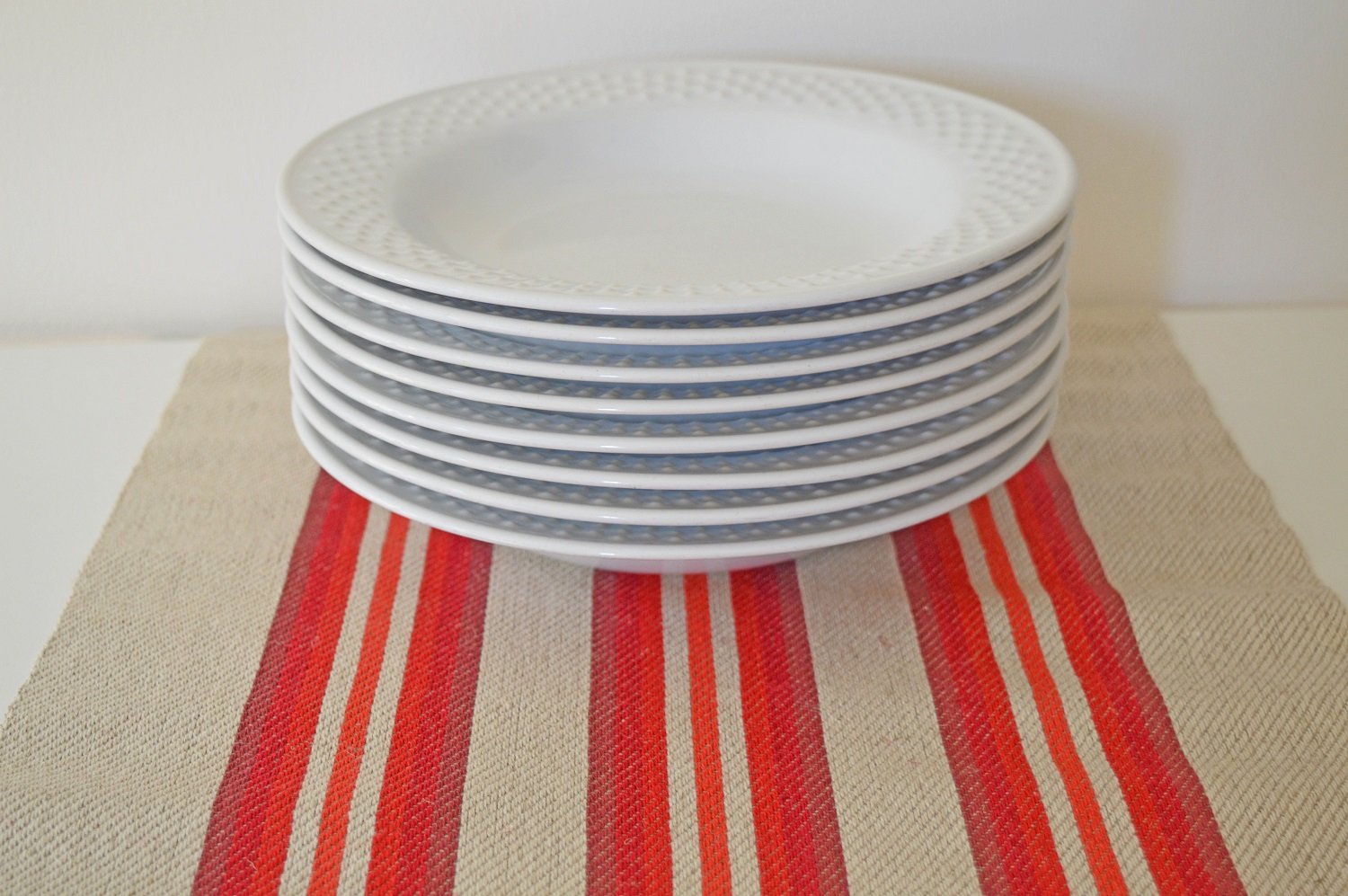 plates on a red table runner.jpg