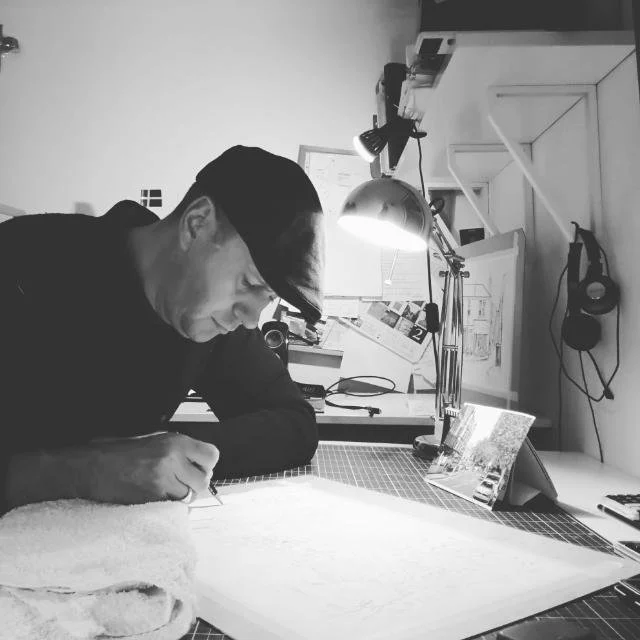 Magnus Rodwell working on a pencil drawing