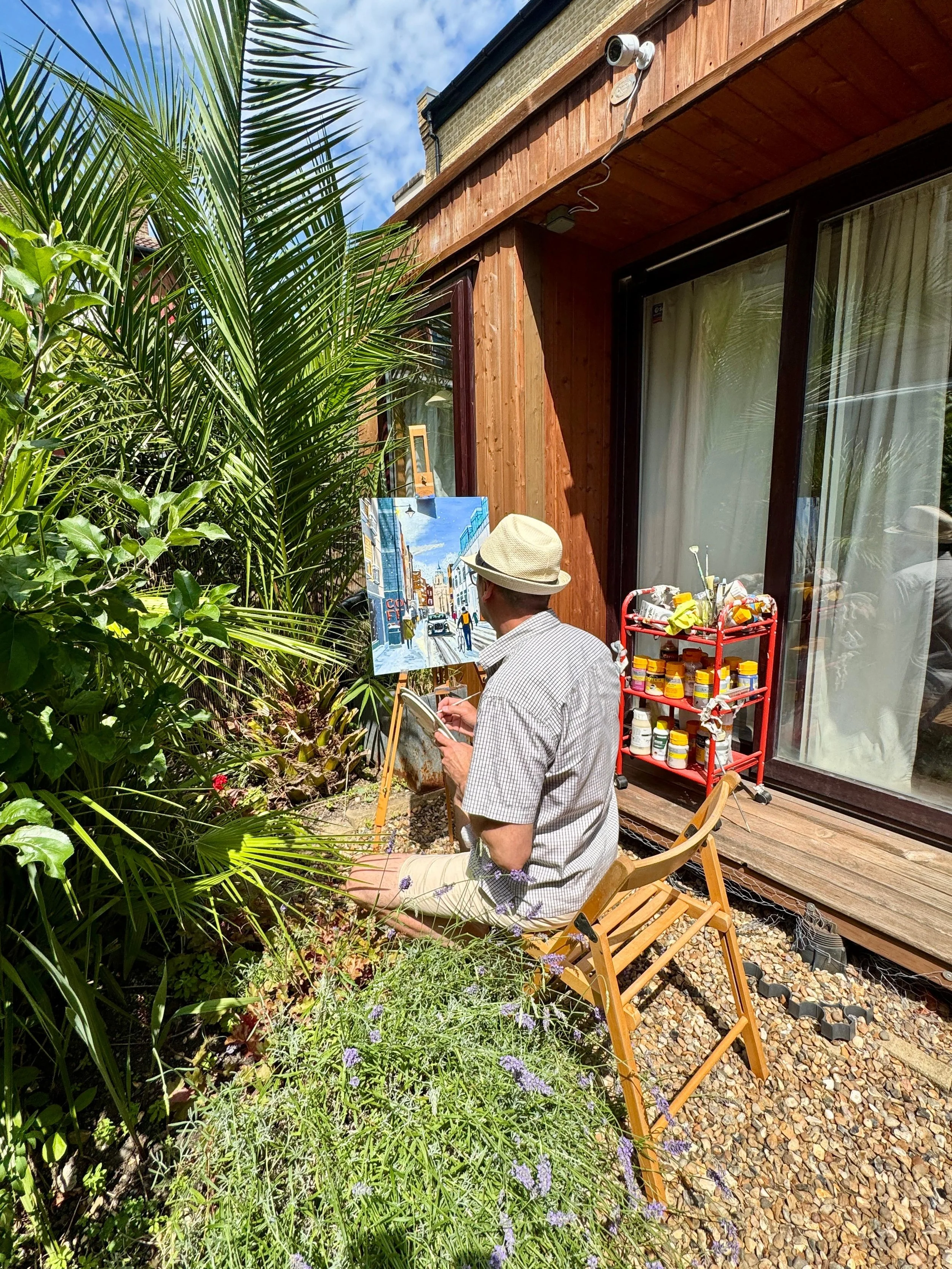 Artist M.Rodwell in the Garden