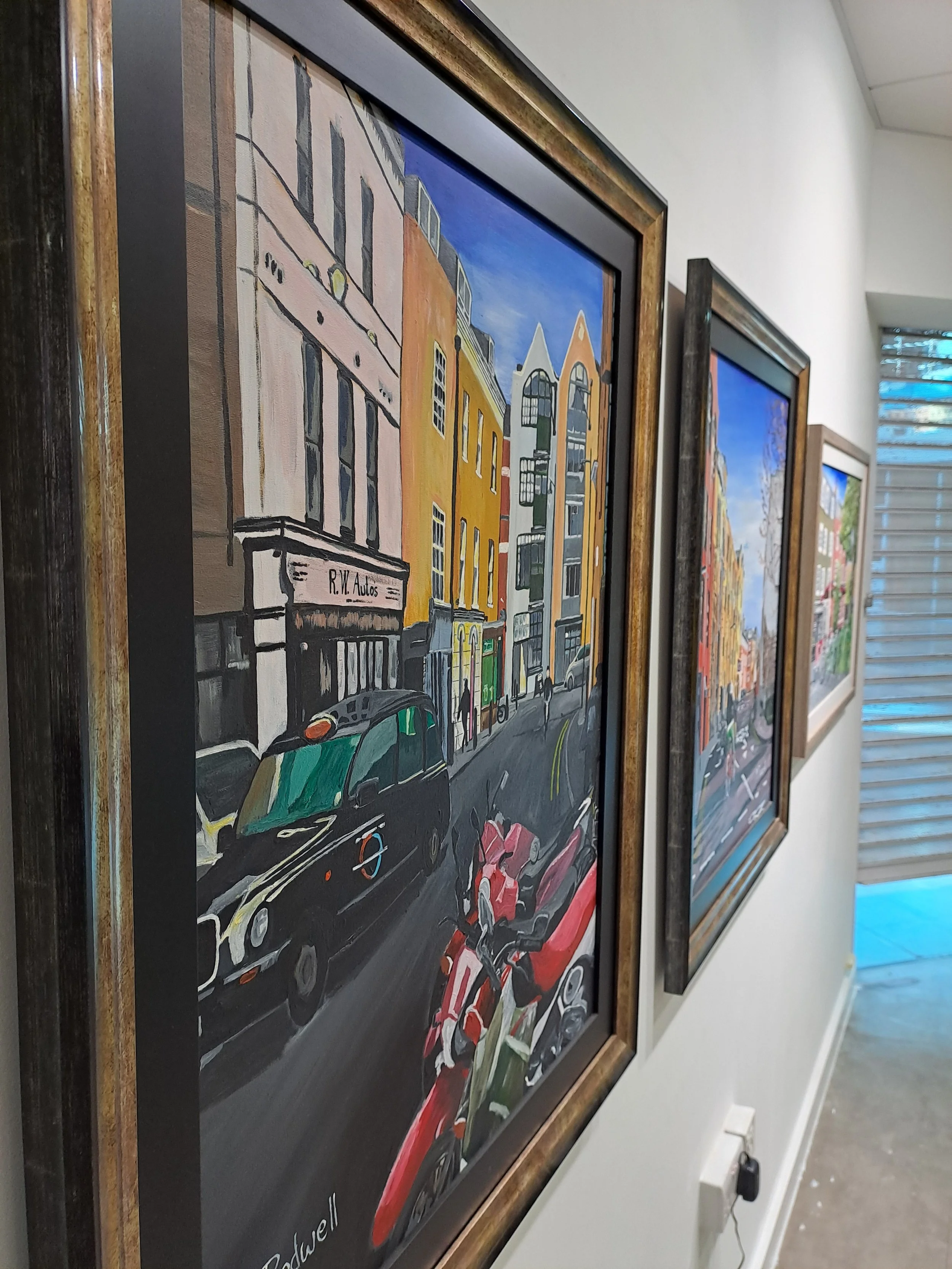 Original framed painting of Morocco Street Bermondsey on display at Magnus Rodwell solo exhibition 'Hidden London'.  Close up of the artwork.