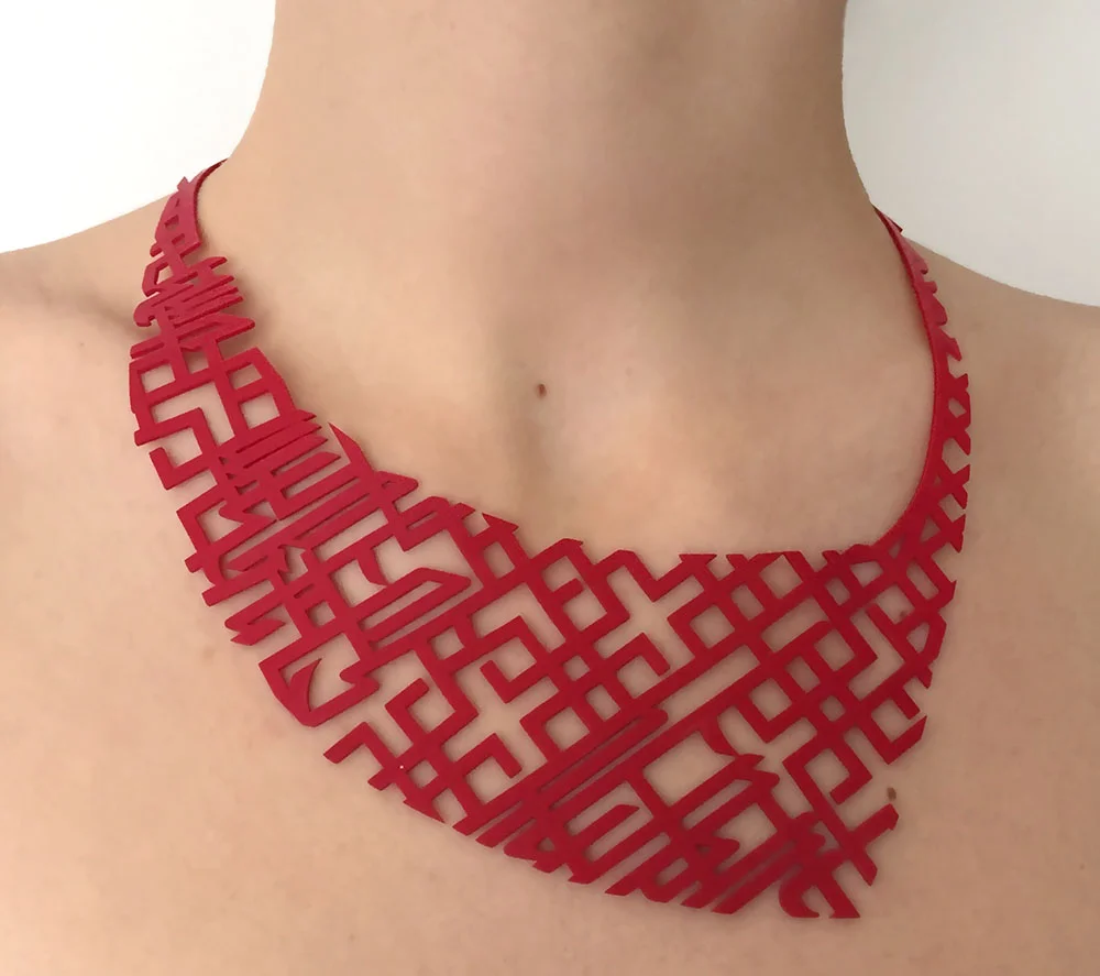 red calligraphy necklace.jpg