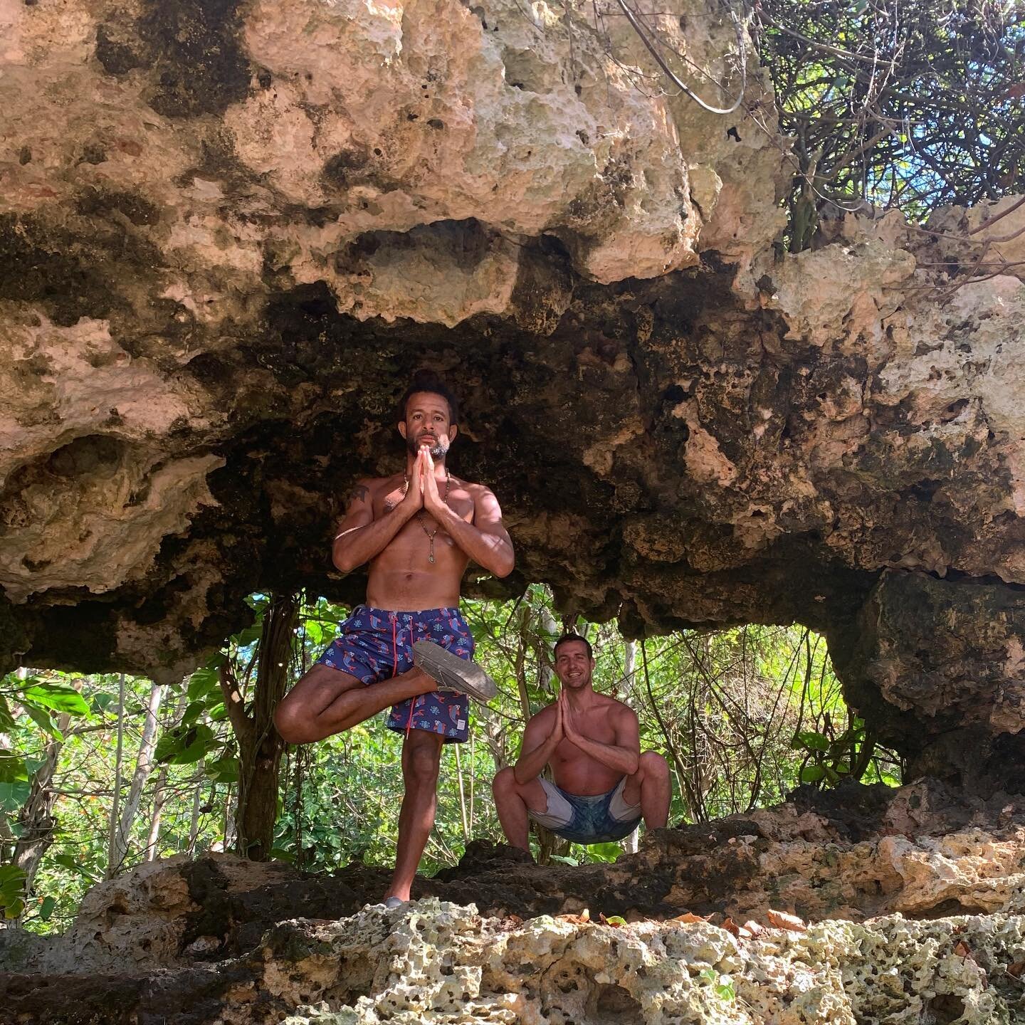 @seanmcdog and I almost walked by this  cave. Always fun to take a yoga asana photo op 😁 thanks @cillayogini for the 📸. #puertorico #yoga #cave #tree #vriksasana #squat #malasana #vrksasana #yogateacher #sukhayoga #hiking #explore #nature #vt #verm