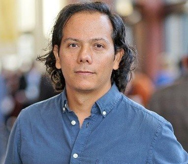   AIRY SINDIK   Airy Sindik has a bachelor's degree in sociology from UNAM and a master's in creative writing from the National University of Colombia. His thesis novel  Without Air for the Return (Sin Aire para el Regreso)  was published by the Guad