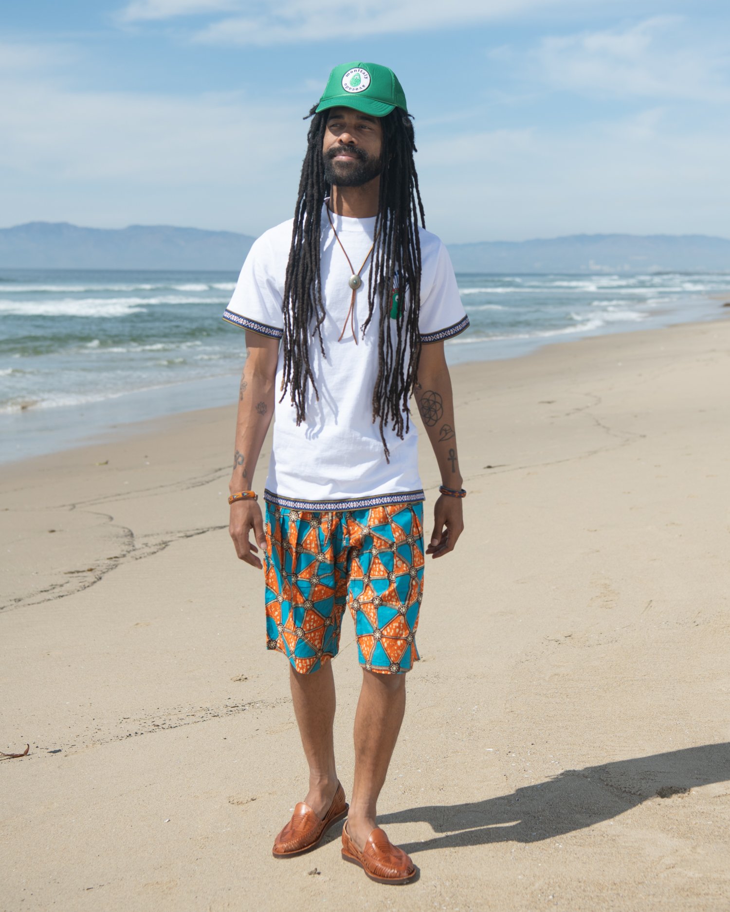 Shorts with Double pleats at the front, along with the drop crotch, create a striking silhouette. 100% cotton Original African Print fabric.