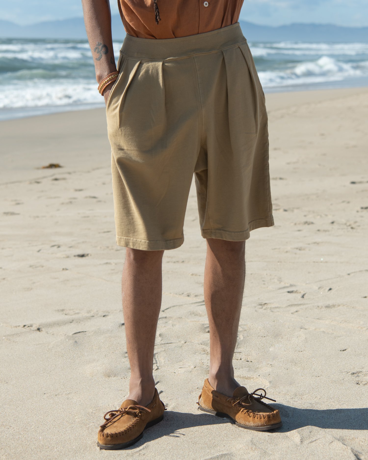 Made from soft French terry fabric, these shorts are as comfortable as they are Luxurious. The pleated design adds a sophisticated touch, making them more than just your average loungewear.