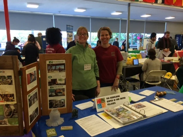 Megan (right) with classmate Kim Reid promoting the Rebuilding Center.