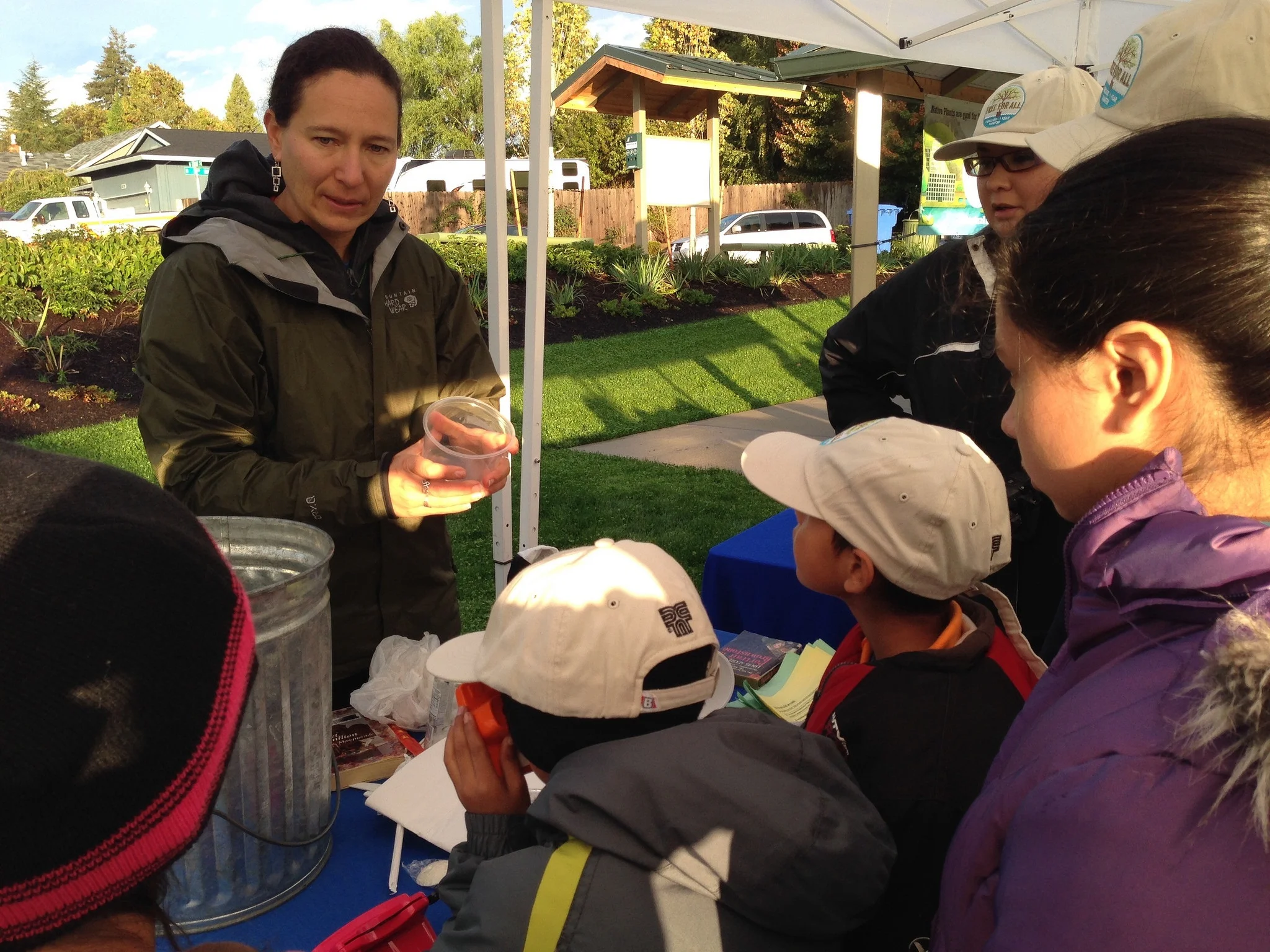 Kids learn about recycling from Leah . 