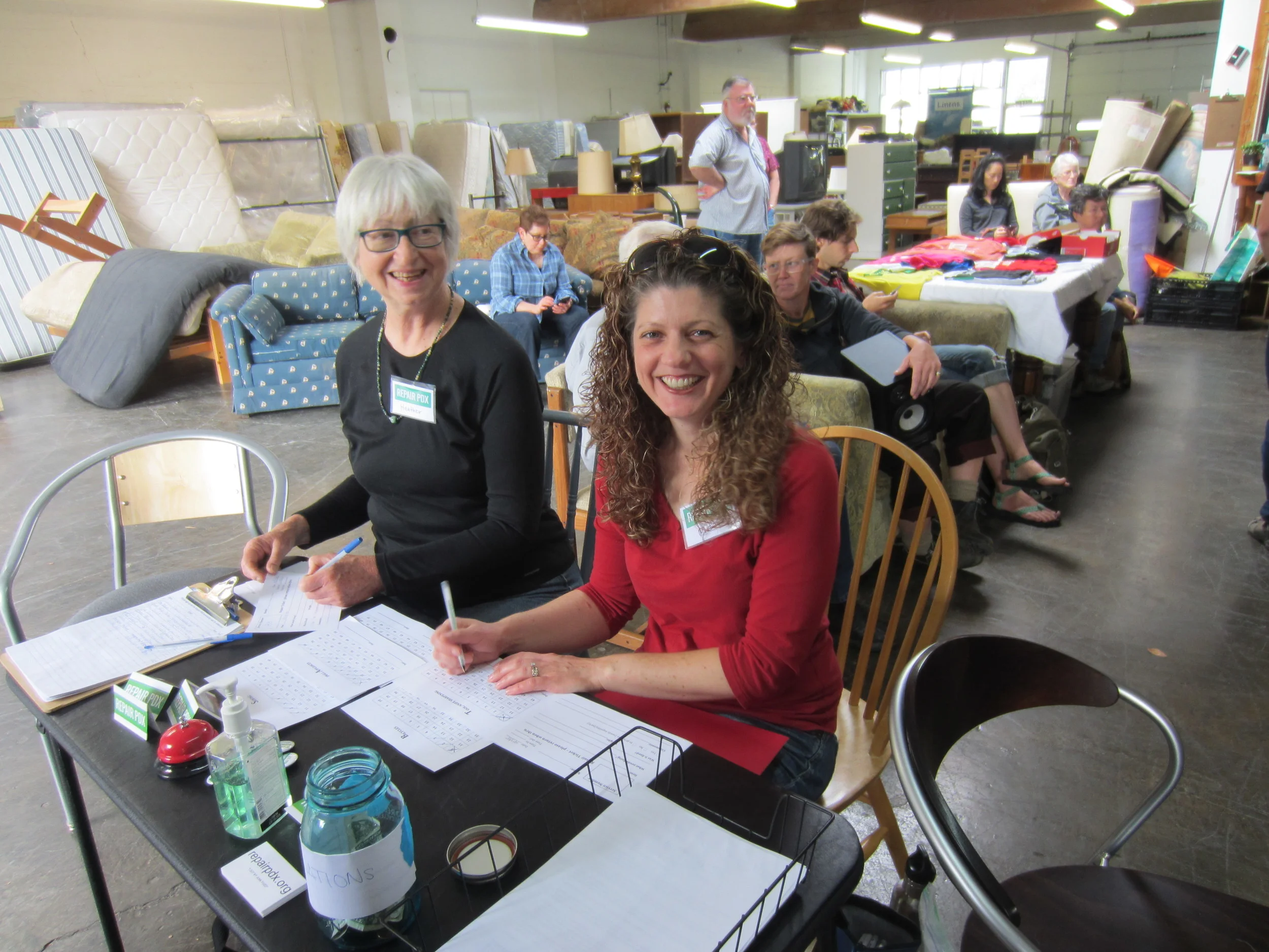 Mitzi Sugar at registration table.