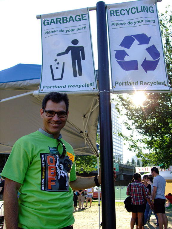 Francisco Gadea (Class 50) models fashionable recycling signs.