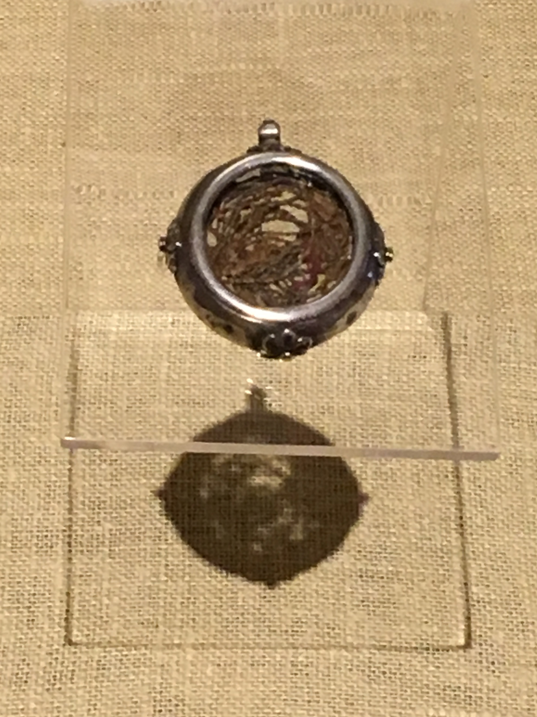   1882 Locket with Threads Pulled from Junipero Serra's Stole  