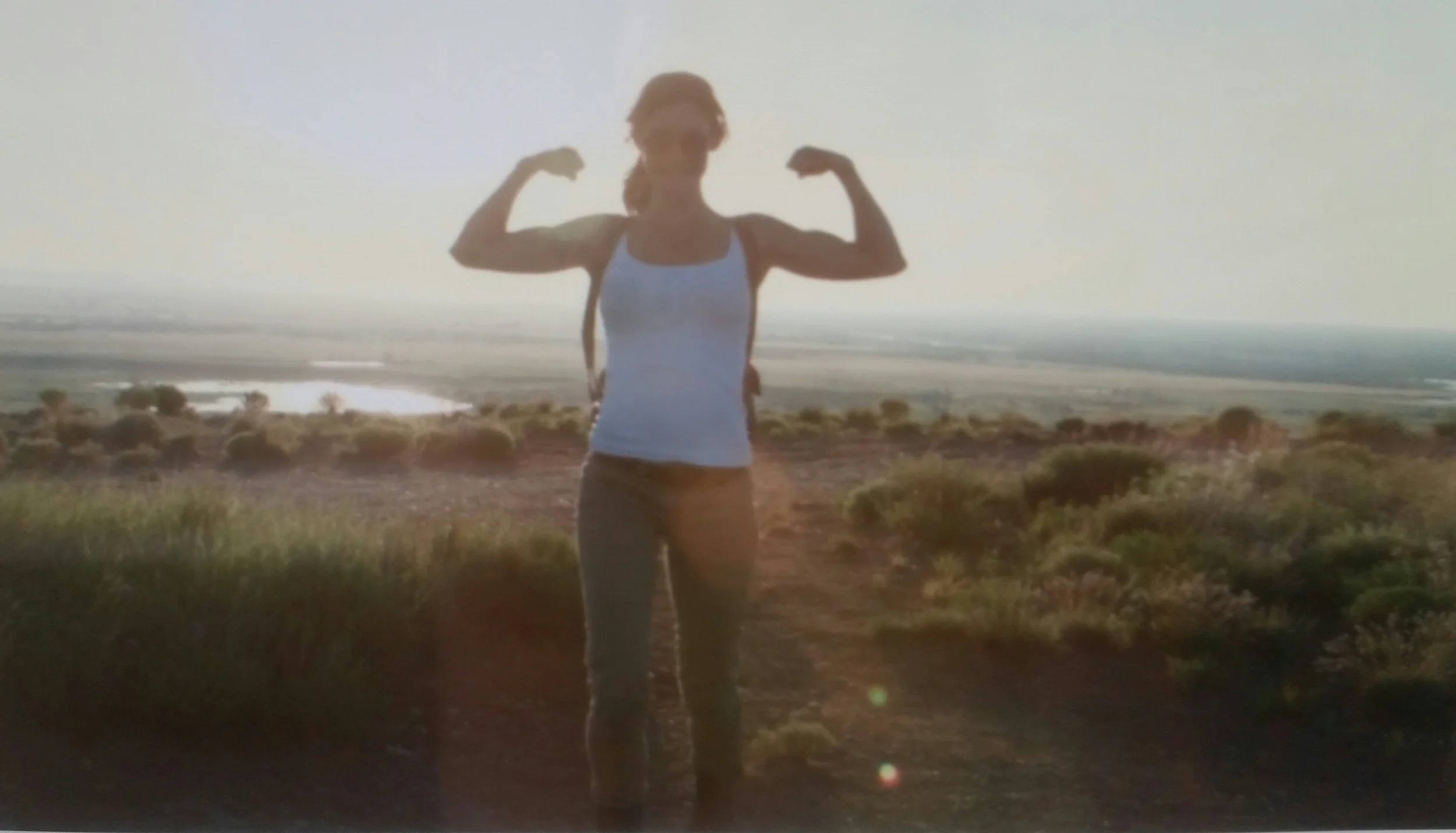 This image is actually from the final location on the final day. I was goofing off as the sunset, we were shooting me walking away and had to retake it quite a few times to get the sun flare just right. Popped some biceps to be cute and Sean liked it :)