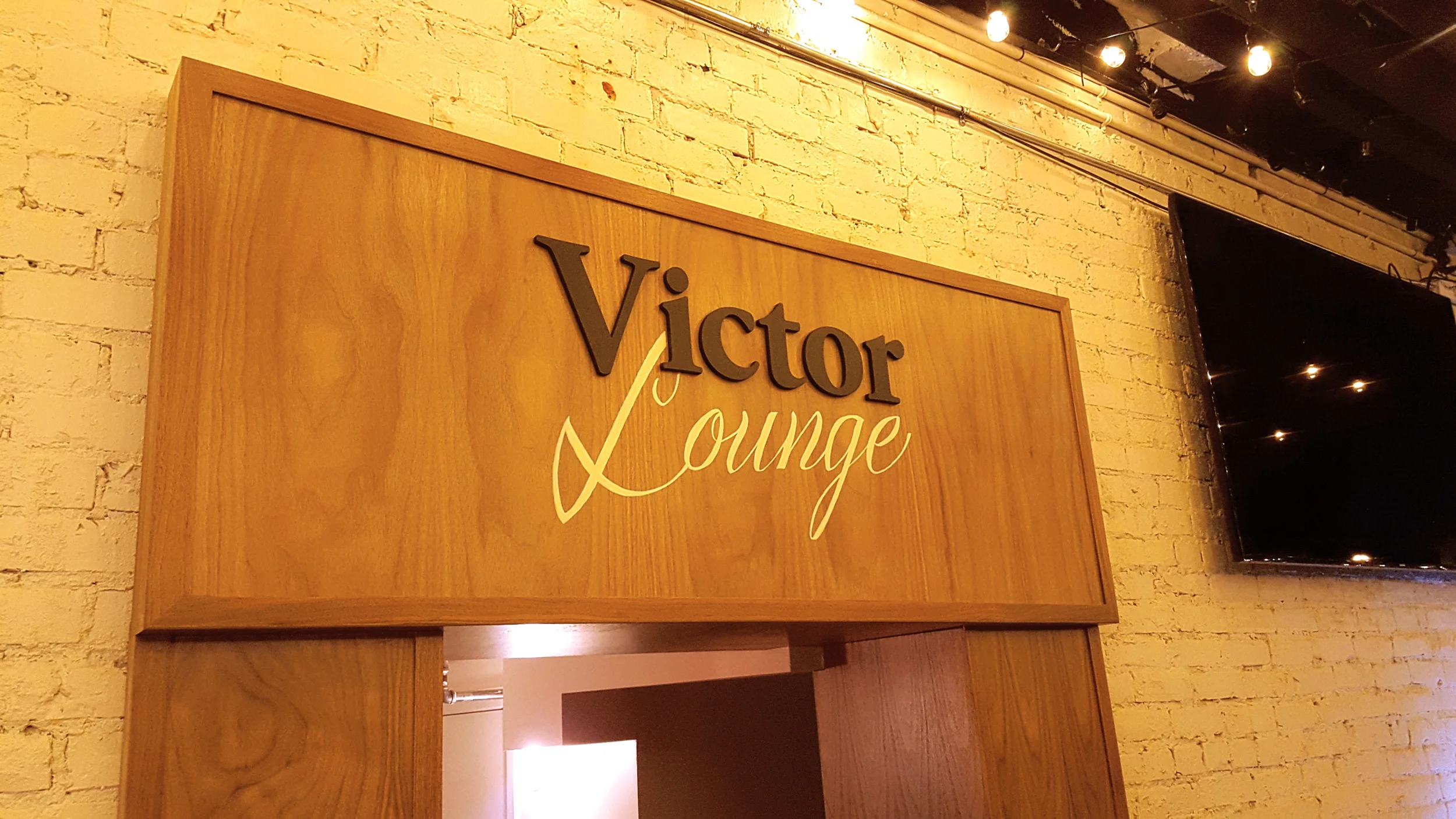 AJALouden-VictorLoungeSign-theNeedle.jpg