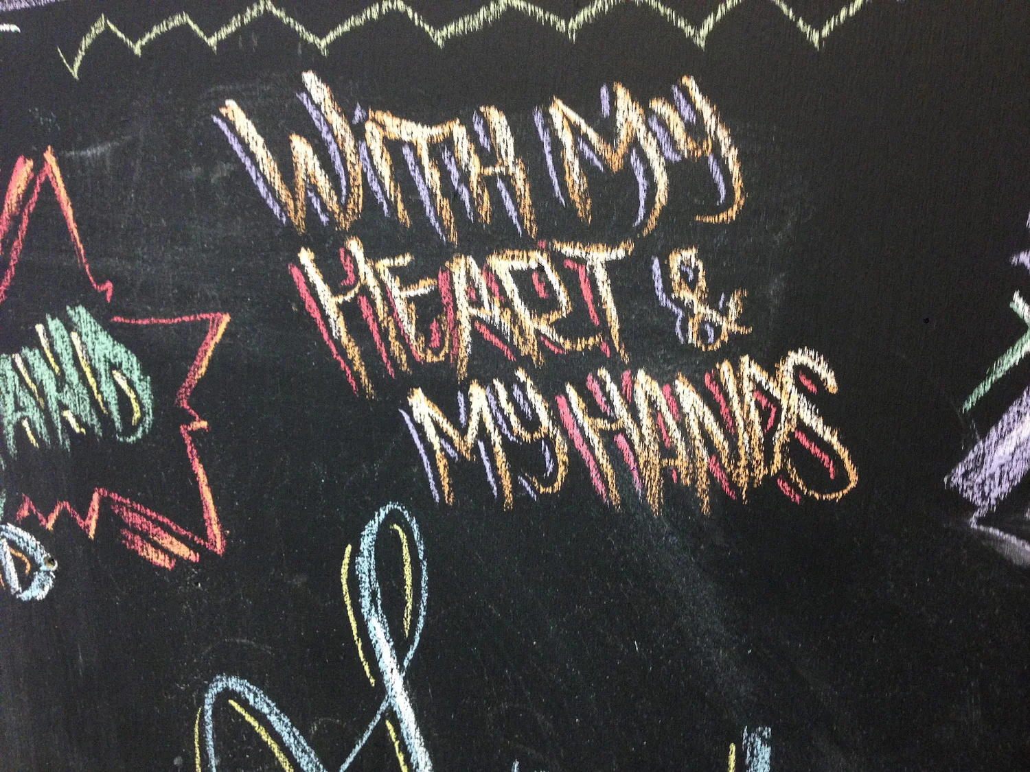 AerosolAcademy-ChalkWall-Closeup-HeartHands.jpg