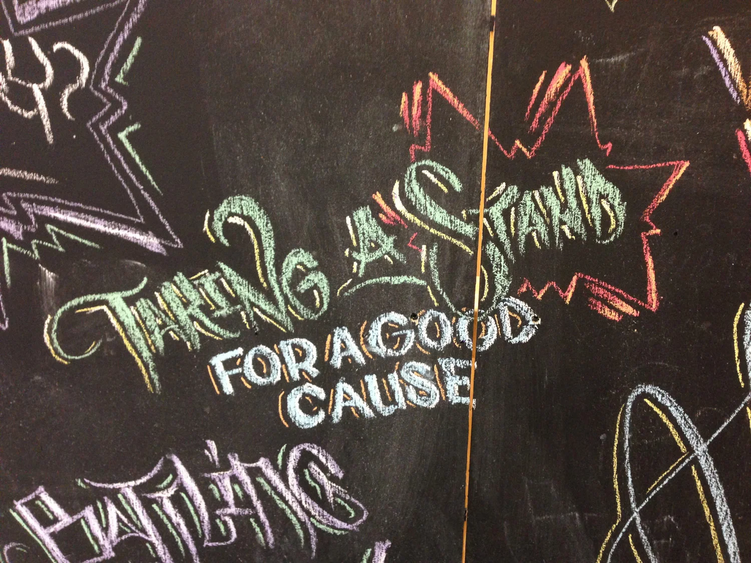 AerosolAcademy-ChalkWall-Closeup-TakingAStand.jpg