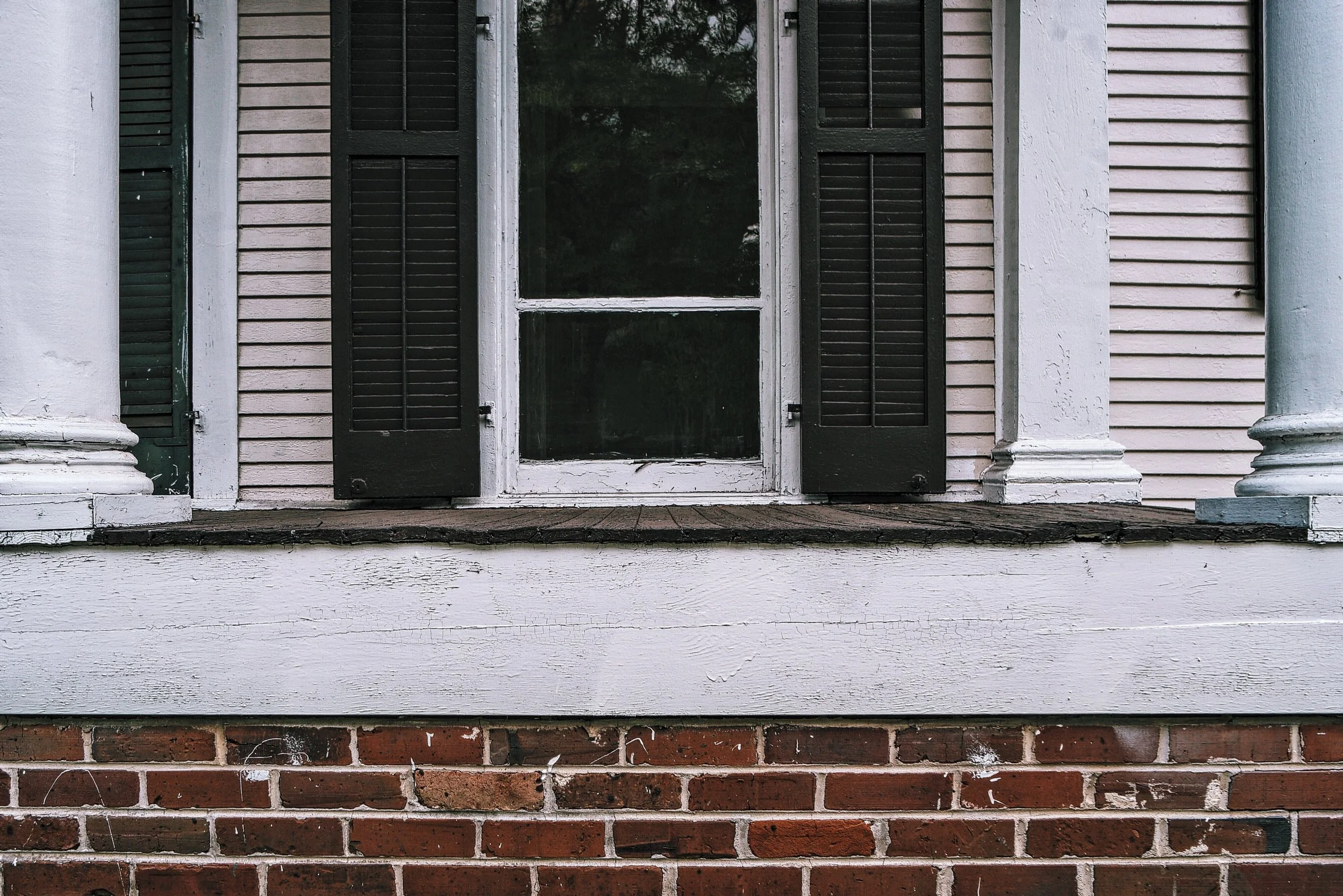 The porch of a well preserved house south of downtown Mobile. 