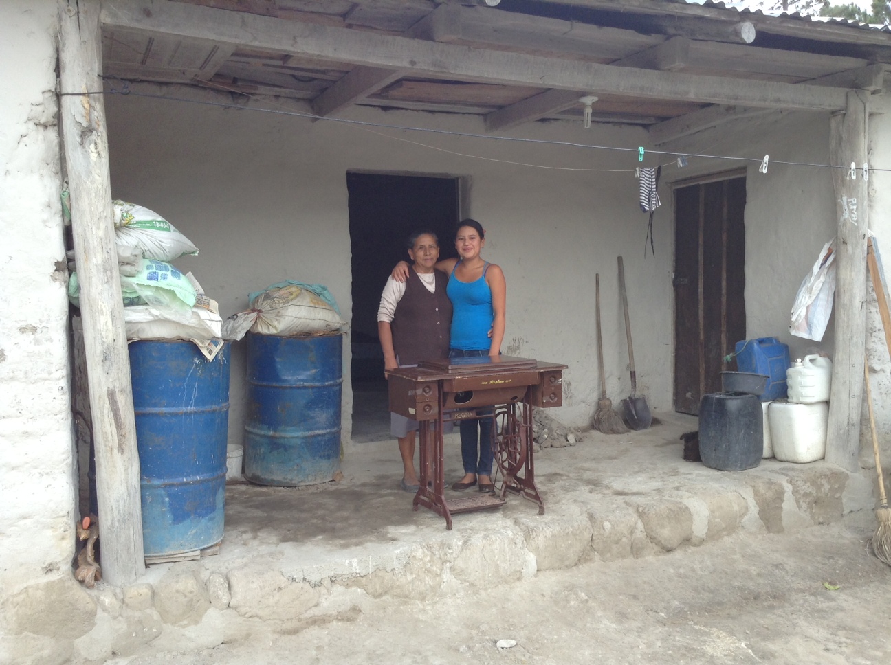  with her mother when her sewing machine was delivered to her home 