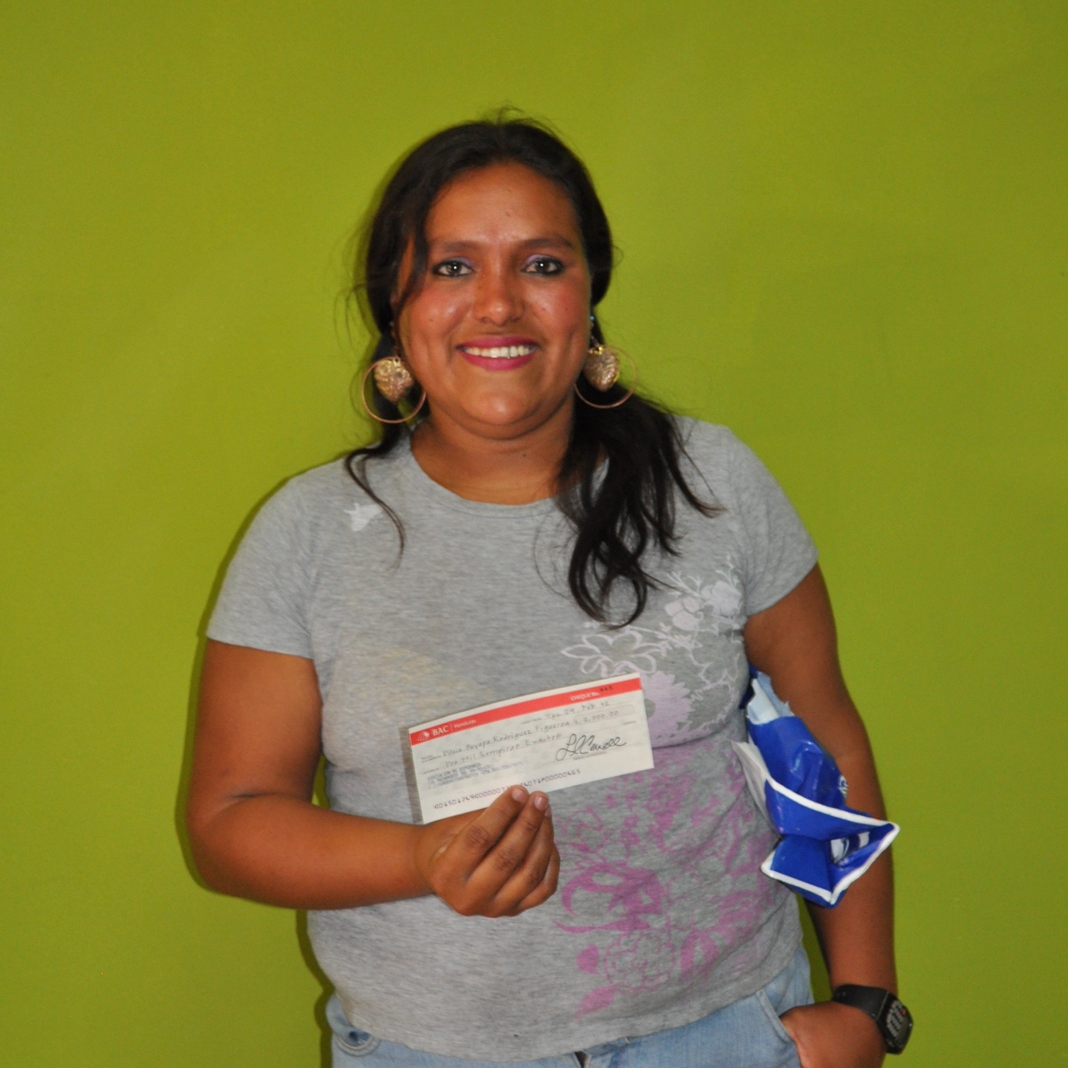 2012&nbsp; Dilcia with her micro-loan check 