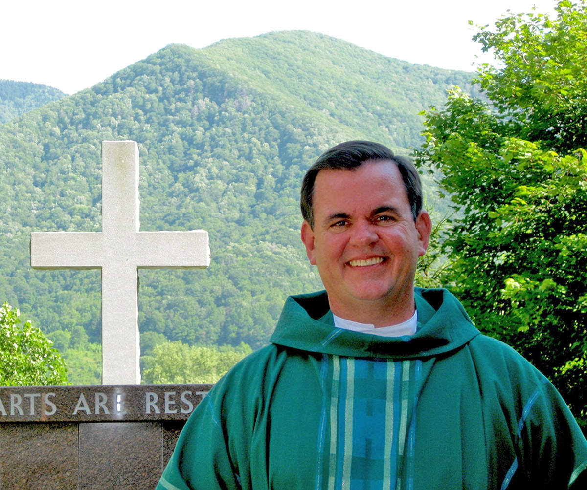 TEACHER OF FAITH — The faith community in Haywood County is mourning the passing of Fr. Jack Denny, O.S.A., who had a profound effect on the spiritual lives of the members of St. Margaret’s Catholic Church, when he served as pastor. Fr. Denny is pictured on the church grounds in 2009. Photo by: Carol Viau