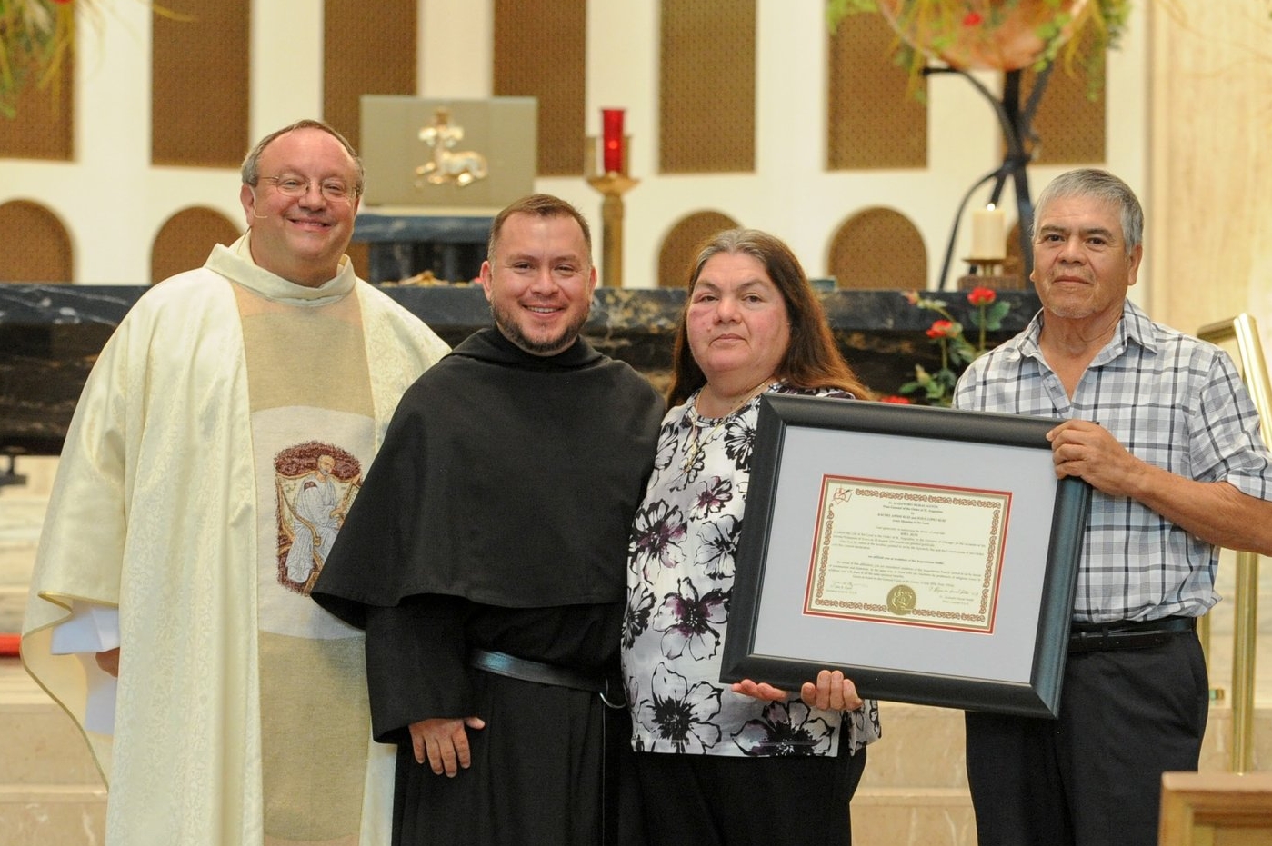 Brother Joe Ruiz, O.S.A., with his Provincial and newly affiliated parents