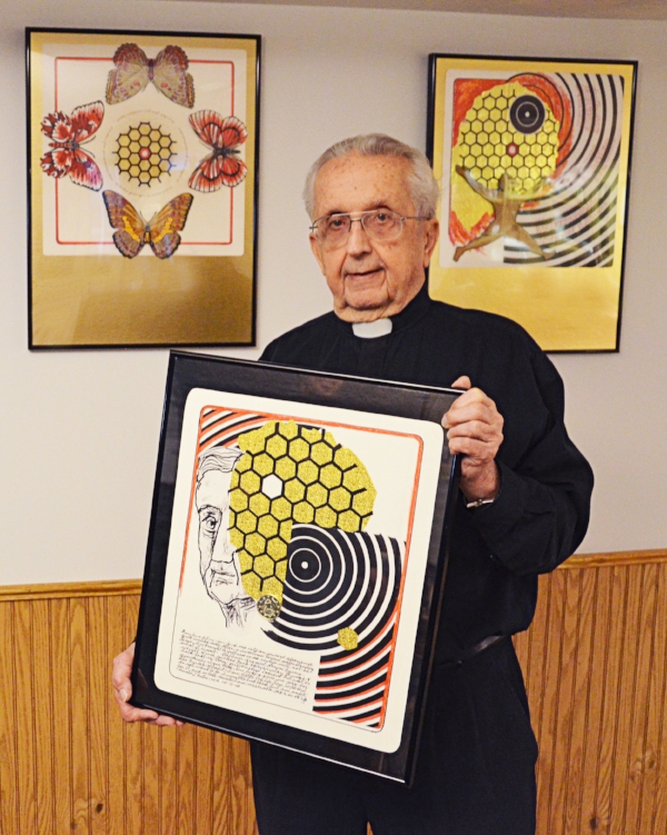 Fr. Bates with three pieces from his series "Wedding of Word & Image"