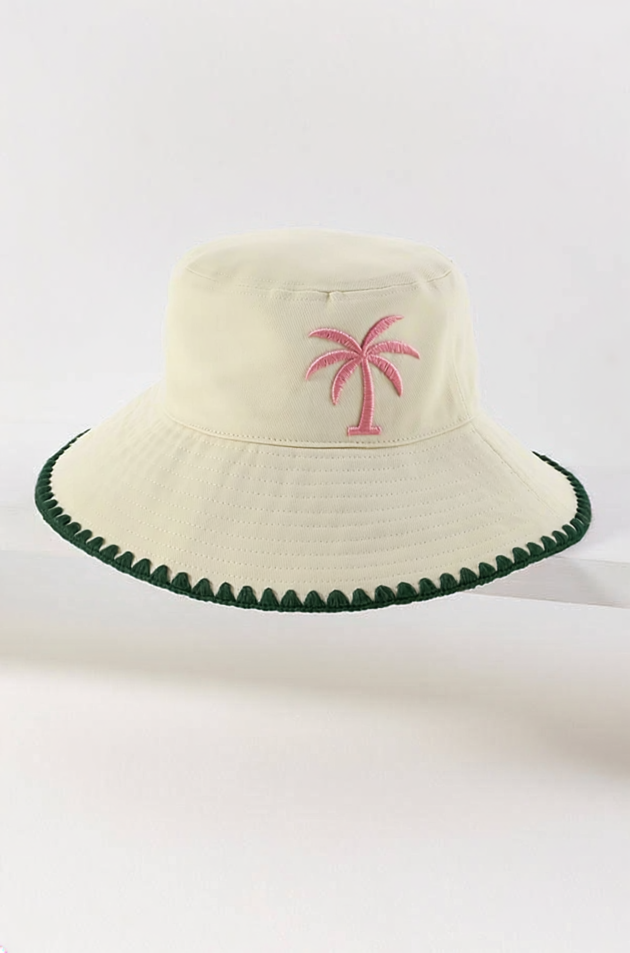 Firefly_change the hat color to be ivory and the trim color on the brim to be dark green and  152265.png