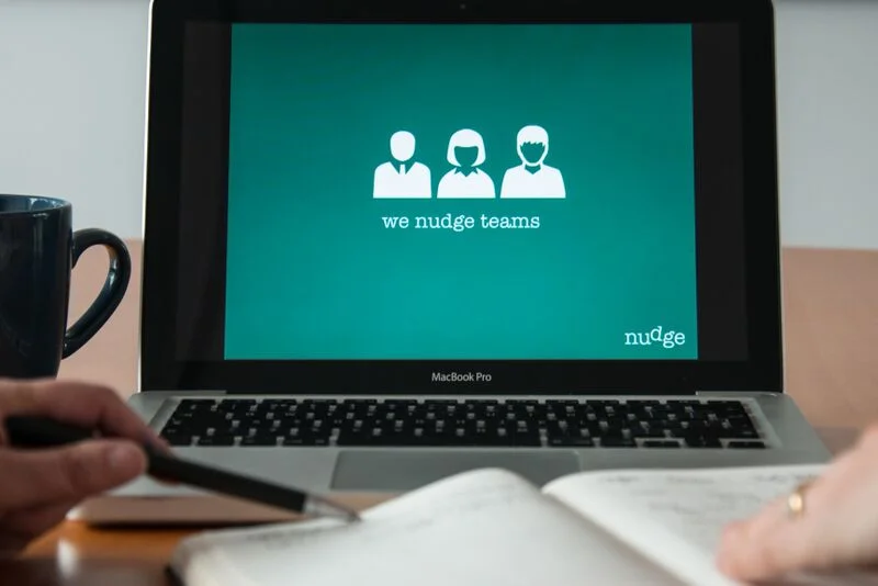 we nudge teams hands.jpeg