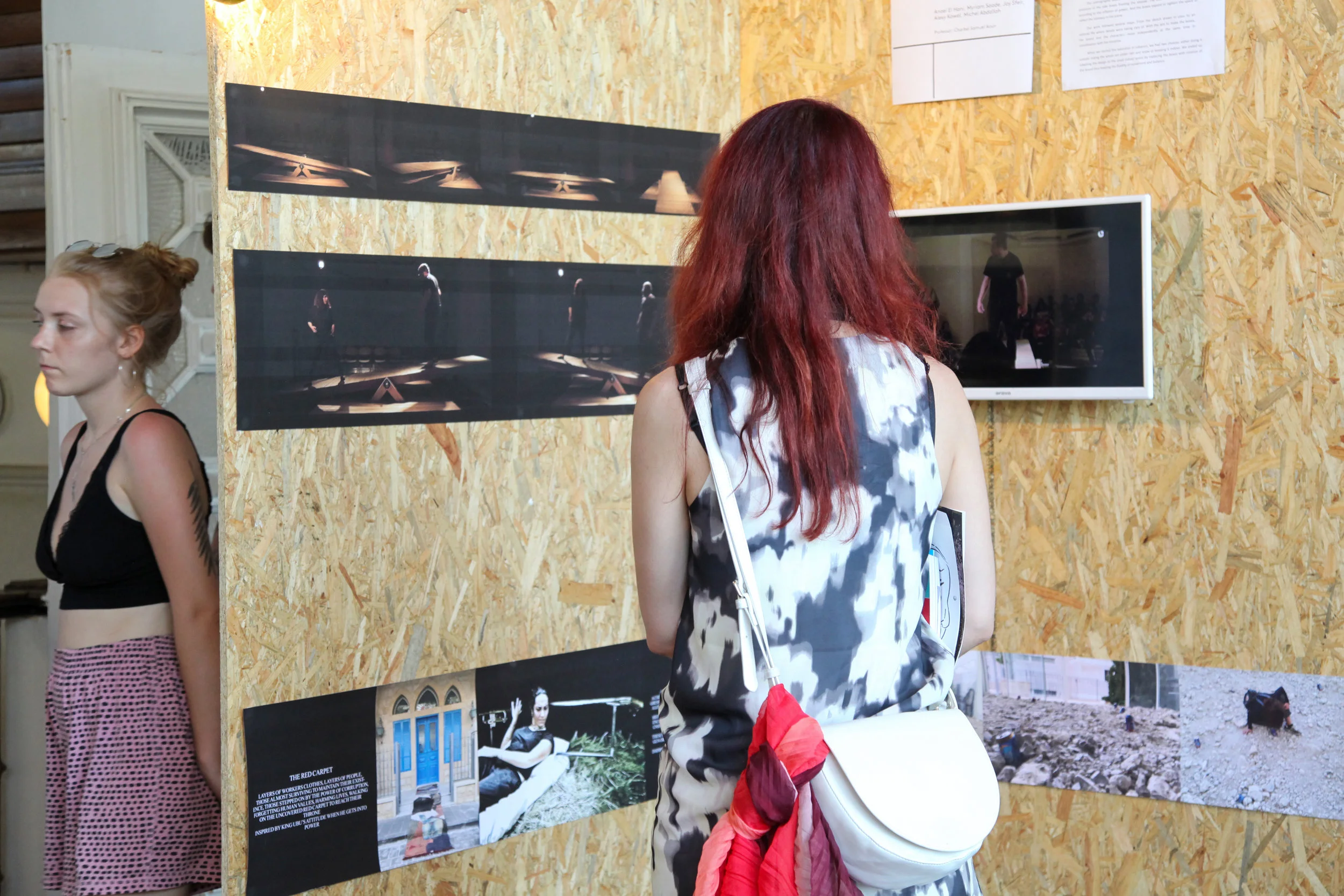 A visitor checking the performance video of Ubu Roi, as designed by the USEK students in the frame of the Common Design Project, a project by the Prague Quadrennial, in June 2019. Photography Ad Achkar, Copyright PQLB, www.pq-lb.org.JPG