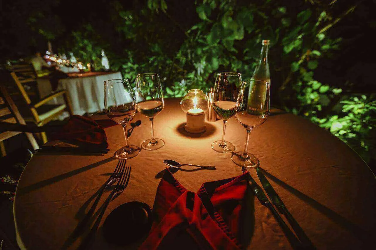 A candlelit outdoor dining table for a romantic date night in Kittery Foreside