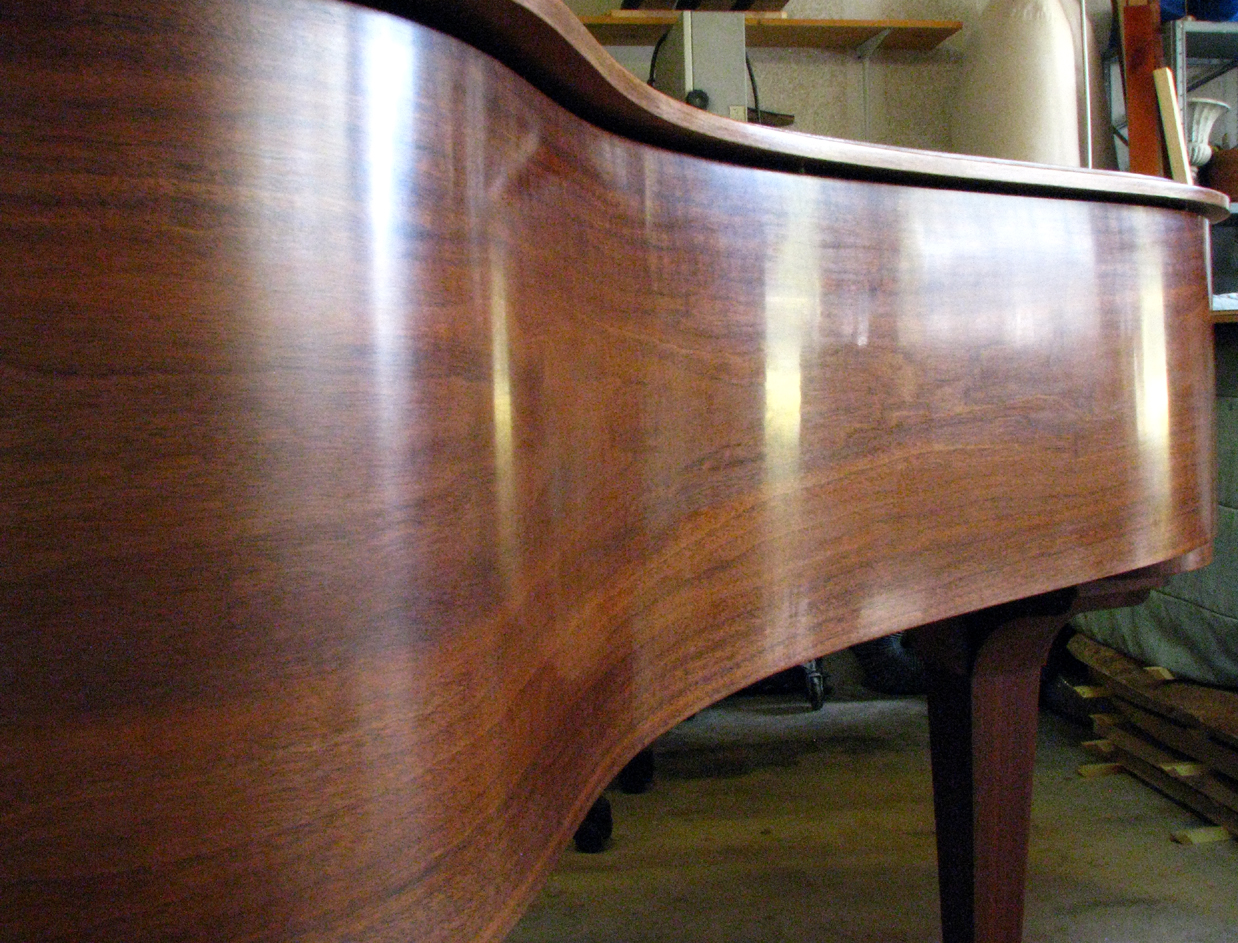 Hand-rubbed clear finish on walnut Steinway & Sons Model M. 2015.
