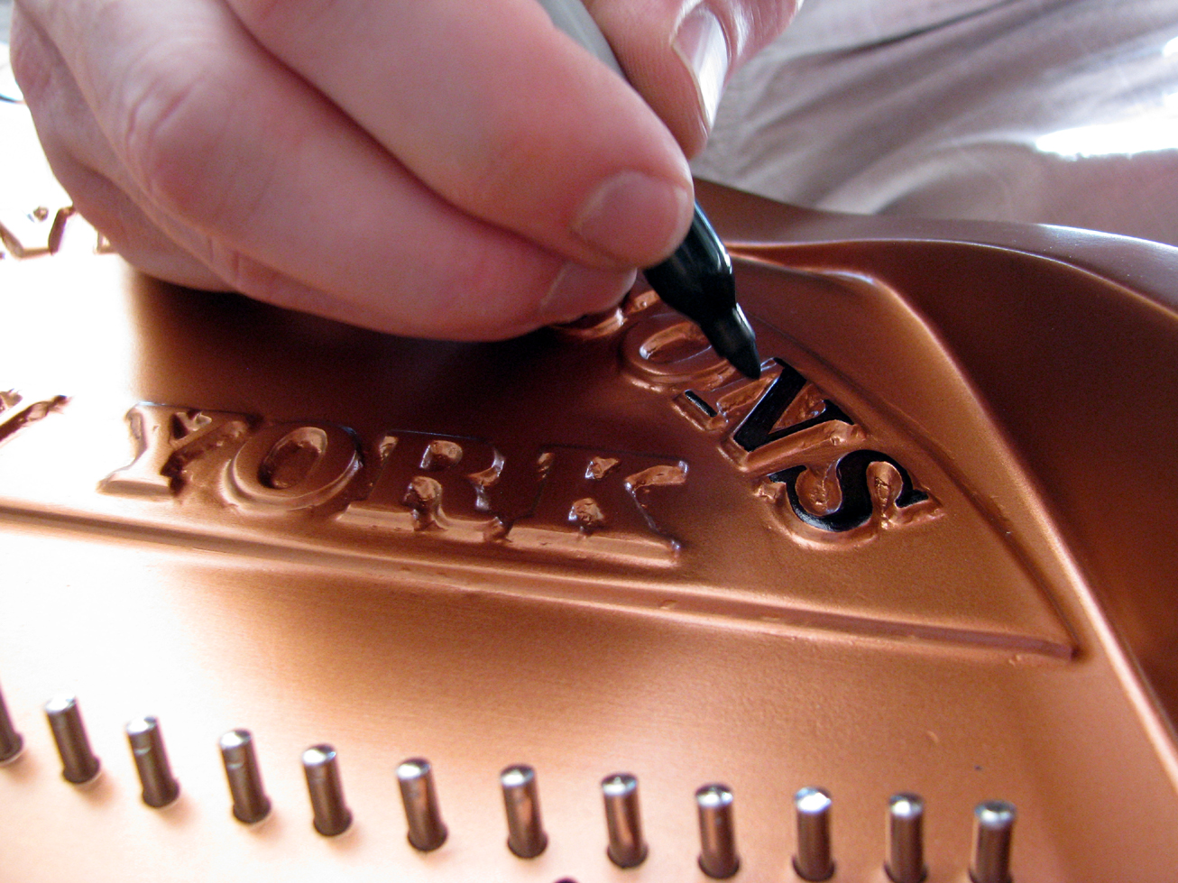  Hand-lettering a plate after refinishing. 2015 